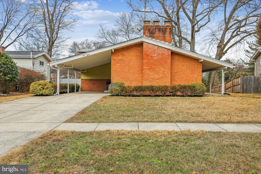 Welcome to this spacious mid-century contemporary home in the highly desirable Kemp Mill Estates neighborhood of Silver Spring. Built in 1958, this home features vaulted ceilings, newly refinished wood floors, recessed lighting, and fresh paint across four finished levels of living space.
The entry level welcomes you with a foyer, leading to an inviting living room with vaulted ceilings, a floor-to-ceiling brick-accent fireplace, an exposed beam, and access to a side patio. This level also includes a versatile bedroom/office with a picture window.
A few steps down, the generous sun-lit dining room provides access to the backyard and connects to the kitchen via a pass-through. Beyond the kitchen, you'll find a half bathroom and a laundry room with an exterior entrance. The lower level features a large family room with a brick fireplace and a convenient storage nook.
Upstairs, three sizeable bedrooms with hardwood floors are complemented by two full bathrooms. The primary suite boasts an updated en suite bath, a ceiling fan, and a built-in wardrobe for added convenience.
The outdoor space includes a picturesque backyard with a patio, a deck, and a storage shed. A carport enhances the home's functionality.
Ideally located near Wheaton Regional Park and Northwest Branch Park, this home offers access to horseback riding, biking and walking trails, the Wheaton Ice Arena, and the Wheaton Library. With easy access to public transportation, shopping, Georgia Avenue, and Columbia Pike, this property perfectly balances tranquility and accessibility.