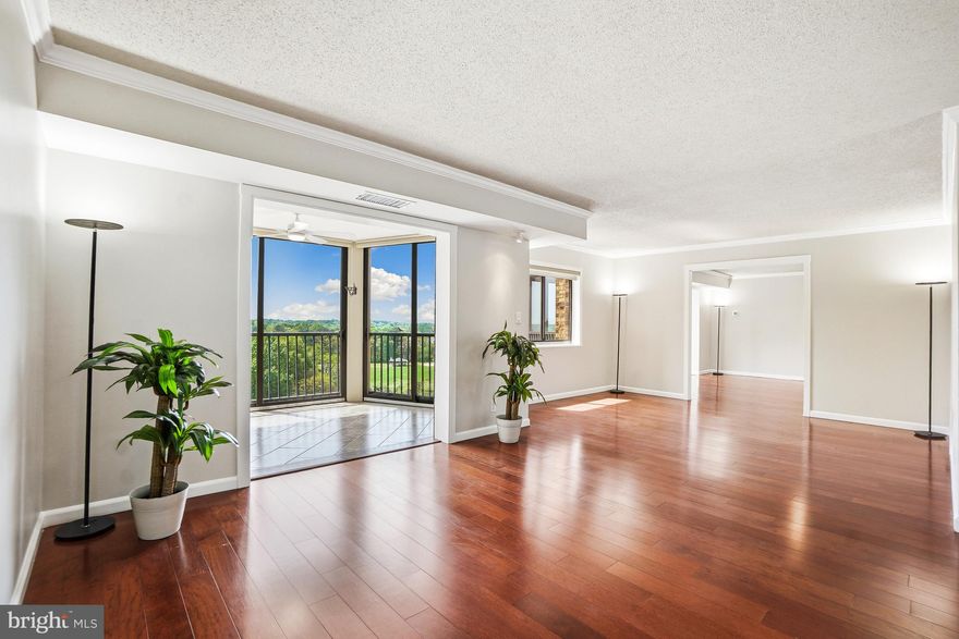 WELCOME HOME TO 5901 MOUNT EAGLE DRIVE, UNIT #1005 at Montebello, -- the area’s premier “AWARD-WINNING” luxury condominium!  •3-BEDROOMS/3-FULL BATHS “RARELY AVAILABLE” COMBINED END-UNIT: 2,155 sq.ft. PLUS, an approx. 225 sq.ft w/TWO SUN/FLORIDA ROOMS/SCREENED-PORCHES, --TOTALING APPROX. 2,280 SQUARE FEET OF LIVING SPACE! Features TWO SEPARATE ENTRANCES, large eat-in kitchen, formal dining room, family room, library, and laundry room. Overlooks Mount Eagle Park and Montebello's woodlands, w/PRIME SUN EXPOSURE! •MOVE-IN READY: Beautifully renovated kitchen, baths, hardwood floors, crown molding, both sun/Florida room glass enclosures replaced/upgraded, upgraded electrical, lighting, freshly painted and more! •MAIN ENTRY FOYER: One of two separate entrances. PLUS, a second private entry, #1007. •LIVING ROOM: Extra spacious for optimal placement of furniture. Features SUN/FLORIDA ROOM/SCREENED-PORCH #1. •FAMILY ROOM: Seamlessly intersects between living room and dining room. •DINING ROOM: Accommodates table for 8 to 10, w/space for buffet and china cabinet. PLUS, adjoins SUN/FLORIDA ROOM/SCREENED-PORCH #2. •LIBRARY: Perfect for library, breakfast room, or other all-purpose room. •EAT-IN KITCHEN: Super spacious/beautifully renovated! Features upgraded cabinetry, countertops, soapstone backsplash, and stainless-steel appliances. Very practical/functional layout, w/plenty of workspace. •PRIMARY/MASTER BEDROOM:  Plenty of wall-space for king-size bed and sitting area, plus has two large walk-in closets. Completely renovated PRIMARY/MASTER BATH features upgraded X-tall vanity and walk-in shower. •BEDROOM #2: This too is a very generous size room. Convenient to the adjoining and FULL BATH #2. •BEDROOM #3: Very private. Distinctly separate from the primary/MBR and BR #2, located at the opposite end of the home.  Located near second private entry to the home. PERFECT FOR “IN-LAW SUITE” or home office. Features two walk-in closets. Adjoining FULL-BATH #3 beautifully renovated too! •LAUNDRY: Features its own DEDICATED LAUNDRY ROOM. PLUS, the building offers commercial W/D for oversized items. •EXTRA STORAGE: Walk-in storage closet off main entry foyer. PLUS, more storage in basement of building. Level B1, Room 11, w/TWO STORAGE BINS, #1005/#1007. •HVAC AND UTILITIES: 2-Zones HVAC for energy-efficiency, w/semi-annual inspection included in condo fee. Hot/cold water also included, electric billed separate w/Dominion Energy, and Verizon FIOS and Cox available for internet, TV, and landline phone. •PARKING: ***** “TWO SIDE-BY-SIDE” GARAGE PARKING SPACES CONVEY - A $70,000 to $80,000 ADDED VALUE! ***** (NOT all Montebello homes offer garage parking.) Bldg. 5901, Level B3, PS #12/#13. Plus, plenty of unassigned parking in parking lot! •ABOUT MONTEBELLO: The area's premier award-winning luxury condominium! A multi-generational community of about 2300 residents within the larger Alexandria-Washington metropolitan area. For this diverse community, Montebello offers numerous amenities, activities, and clubs for many varied interests. MONTEBELLO IS AN EXCEPTIONAL VALUE, IS WELL-MANAGED AND HAS NEVER HAD A SPECIAL ASSESSMENT! A gated community of mostly 35-WOODED ACRES. Amenities include FREE SHUTTLE OR 10-MINUTE WALK TO METRO, including shuttle to major area shopping centers, EV charging stations, indoor/year-round salt-water swimming pool, outdoor swimming pool, fitness center, tennis courts, pickleball, basketball, walking/nature trails, picnic/grilling areas, playground, bowling alley, game room, hobby rooms, party rooms, on-site restaurant/cafe bar, convenience store with dry-cleaning service, hair salon, and more! Beautiful grounds and common areas, pet-friendly with dog park, on-site management, engineering, housekeeping, maintenance, and 24-hour gate and grounds patrol. NEW MONTEBELLO COMMUNITY CENTER NOW OPEN - AN ABSOLUTE MUST-SEE ON YOUR VISIT! Plus, Montebello is a non-smoking community.