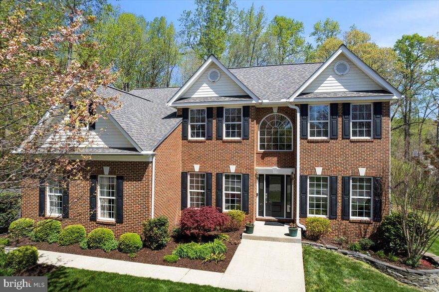 ****CURRENTLY ACCEPTING SHOWINGS!!!!***** HOME IS UNDER CONTRACT BUT SUBJECT TO A 72 HOUR KICK-OUT CLAUSE. AGENTS & BUYERS - DO NOT HESITATE TO SCHEDULE A SHOWING! 

CLASSIC COLONIAL IN THE HEART OF HUNTINGTOWN, CALVERT COUNTY, MD! Prepare to be captivated by this magnificent modern-styled residence, showcasing over 5,000 square feet of beautifully finished living space. This 5 bedroom, 4.5 bathroom home is a true gem in the sought-after Marley Run community. 

Discover a thoughtfully designed layout that includes a main level guest suite with a private full bath - perfect for multigenerational living or visiting guests. The home has been stunningly renovated with a professional interior designer to include a dream kitchen featuring a massive waterfall-edge granite island, updated appliances and seamless hardwood floors throughout the main level.  Appliances include a wall oven and built in microwave above, hidden control dishwasher, french door refrigerator with pull out bottom freezer & produce drawer, a dual oven range with cooktop & warming drawer - all in a black stainless finish. A standout feature of the main level living area is the dual sided gas fireplace with floor to ceiling tile.  This gorgeous feature creates warmth & an inspiring sense of style and sophistication to the open and outstanding floor plan. 

Upstairs, you will find four spacious bedrooms & two full baths, including a luxurious owner’s suite with a spa-like private bath. Relax in the enormous, oversized shower with dual shower heads and frameless glass enclosure or unwind in the soaking tub with a stylish ceramic tile surround.  Dual vanities with granite countertops & an incredible walk-in closet with a granite-topped center island create a high-end dressing room experience.

The fully finished lower level offers endless possibilities with a large and open recreation room with included pool table, a stylish bar with custom upper and lower cabinetry, 2 beverage refrigerators, plus a bonus den with a walk-in closet - ideal for a home office, gym, or even a sixth bedroom. There is also plenty of storage space and a dedicated workbench area, perfect for projects and keeping belongings organized with ease.  Along a recreation room wall is a show piece - a remarkable, custom, 500-gallon marine fish tank - bringing tranquility & beauty into the lower-level area. The lower level even features a pellet stove for additional ambiance and energy efficiency as well as a tankless hot water heater & a brand new main level & first floor HVAC system! Roof is also newer, less than 5 years old!

Outdoor living is just as impressive, with an expansive deck overlooking the serene, wooded backyard views. There is even a gas connection for a grill hook up on the deck. The extensive hardscaping and professional landscaping create a backyard resort-like retreat, complete with a large, custom gas fire pit with room for seating 10+ around the fire - perfect for entertaining! Located within a top-ranking school district and just minutes from major commuter routes 2 and 4, this exceptional home truly has it all. Don’t miss your opportunity at this beautiful home!