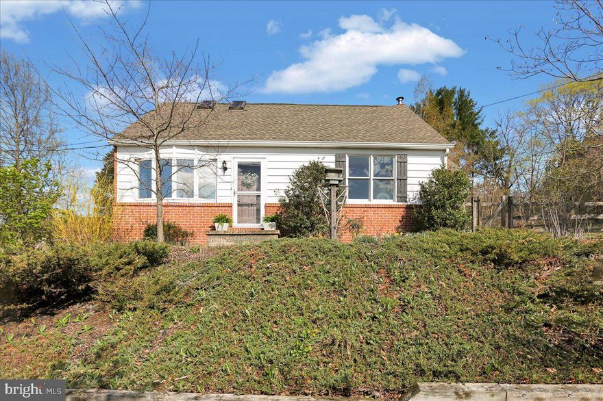 Highest and Best offers due by Thursday April 17 by 8am.  Welcome to this extremely well-maintained property with tons of character and amazing views, located less than 2 minutes to Rt 222.  This cape cod offers hardwood floors throughout and bay windows from the living room and dining room that provide views for miles.   The living room has wood ceiling beams and a built-in cabinet, as does the dining room, which flows seamlessly into the kitchen.  The mudroom/laundry room is conveniently located off the kitchen.  There is a first-floor bedroom and full bath.  Upstairs is the primary bedroom with a vaulted ceiling and skylights and the 3rd bedroom that also has a vaulted ceiling, and another full bath.  The finished lower level offers a family room with a wood stove, which is the primary heart source for these owners, and a bonus room with a built-in desk and workstation…whether you use this space as an in-home office, hobby room or homeschooling, you have plenty of workspace!  There is a one car attached garage with a small storage room in the back.  We’re just getting started…because the real party is outside! There are 3 outbuildings; a woodshed that is conveniently located off the driveway to store your firewood, a large garden shed and a custom-built barn complete with electric and heat located at the back of the property, a great place for a barn party!  The fully fenced-in backyard offers a 2 tiered deck and patio and a pergola with a swing and the mature landscaping gives this property eye-catching curb appeal. In addition to the new vinyl siding in 2018, this home offers all vinyl replacement windows a 10 year old roof and a radon remediation system. and a central vac.   This home is truly move in ready!