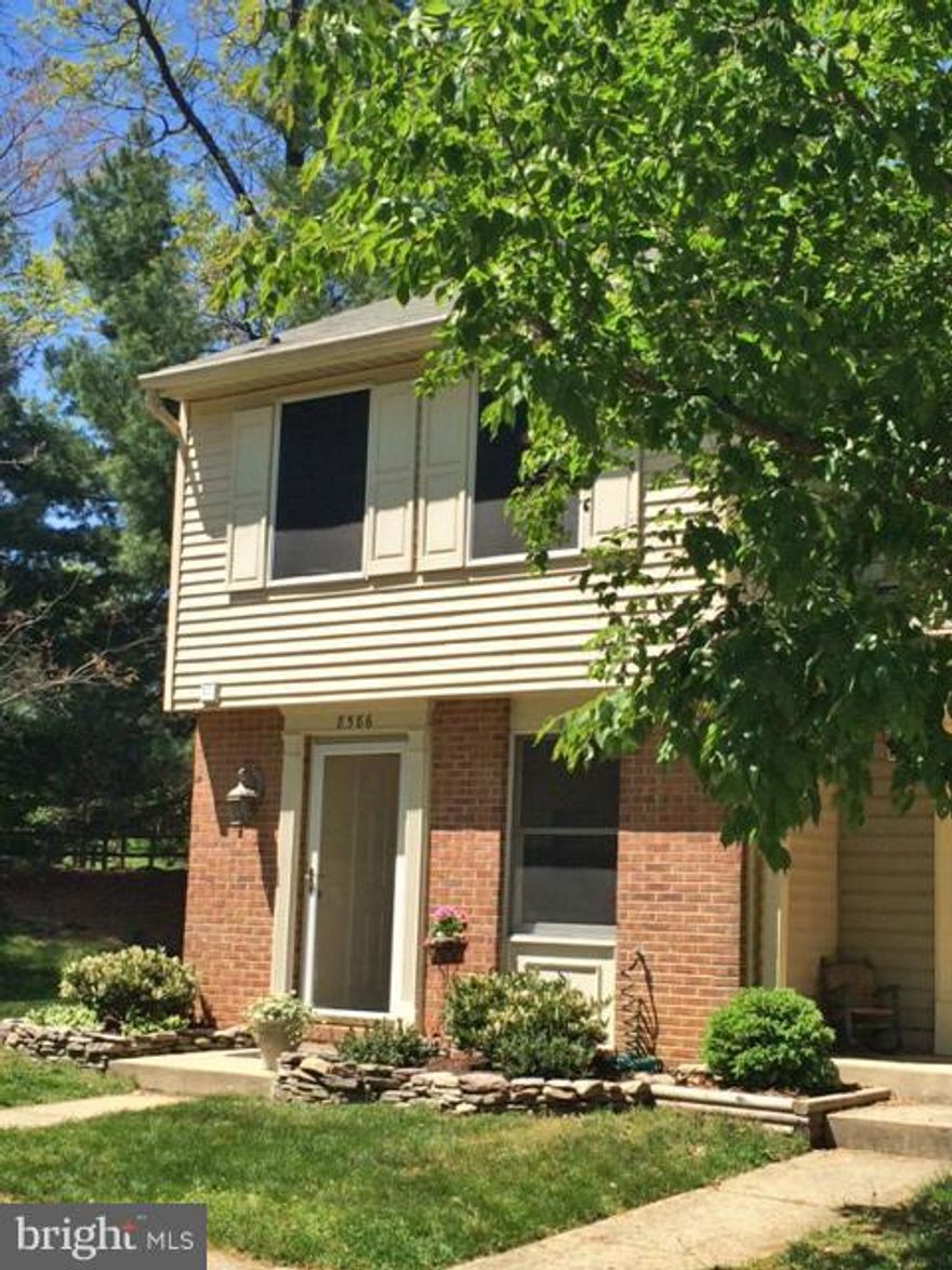 Finished to perfection! Bright 2-level 2 BR 1.5 BA end unit townhouse with glass doors leading to stained deck & fully landscaped, fenced back yard.  All white granite kitchen with mosaic back splash. Remodeled baths. Hardwoods & new plush carpeting. Custom paint. Dimmer switches. Plenty of storage incl shed. 1 assigned & plentiful guest parking.