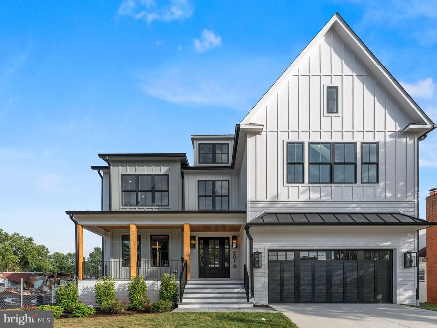 Discover the perfect blend of luxury, comfort, and convenience in one of Bluemont’s most sought-after neighborhoods, just moments from the Ballston Metro, beautiful parks, delicious dining, and vibrant shopping destinations.

Step inside this spacious new home with over 5800 sqft featuring 6 bedrooms and 6.5 baths. You’ll immediately notice the airy 10-foot ceilings and elegant white oak floors that flow throughout the main level, complemented by designer light fixtures and stylish tiles.

Love to cook or entertain? The chef’s kitchen is sure to impress, boasting a show-stopping oversized waterfall quartz island (complete with a built-in beverage center), premium 48” appliances, and a custom hand-painted plaster range hood with a convenient pot filler above the gas range. The adjacent butler’s pantry offers plenty of storage, while the elevated dining room, featuring a striking wood slat tray ceiling sets the scene for memorable gatherings.

Unwind in the sun-filled family room, where the large Andersen windows, a cozy gas fireplace with custom plaster details, and a beamed ceiling create a welcoming and sophisticated space. Open the 15-foot multi-sliding panels door and step out to the spacious Trex deck, perfect for outdoor entertainment or relaxing in the shaded, flat backyard,complete with a gas hookup for grilling. 

The main level also includes a peaceful home office with classic wainscoting, a generous en-suite bedroom for guests or family, and a custom mudroom conveniently located off the two-car garage.

Upstairs, retreat to the stunning primary suite with vaulted ceilings, skylights, two walk-in closets, and a spa-inspired bathroom featuring heated floors, a luxurious wet room, and dual vanities. Three more bedrooms, each with their own private bath and custom walk-in close plus a versatile loft and a light-filled laundry room with a waterfall quartz countertop, complete the upper level.

The walk-up basement expands your living space, offering another en-suite bedroom (ideal for guests or multi-generational living), a bold, color-drenched theater room, a wet bar with an additional beverage center and dishwasher for easy entertaining.

Outside, the home showcases timeless curb appeal with Hardie plank siding, board-and-batten accents, a welcoming covered flagstone porch with a metal roof, and a custom handmade iron railing. Enjoy peace of mind with modern systems, including a 30-year architectural shingle roof, tankless gas water heater, dual-zone Carrier HVAC, and Cat 6 wiring throughout.

5016 6th Street is more than a house, it’s a place to call home, blending exceptional style, generous space, and an unbeatable location in the heart of Bluemont. Come experience it for yourself; you won’t want to leave!