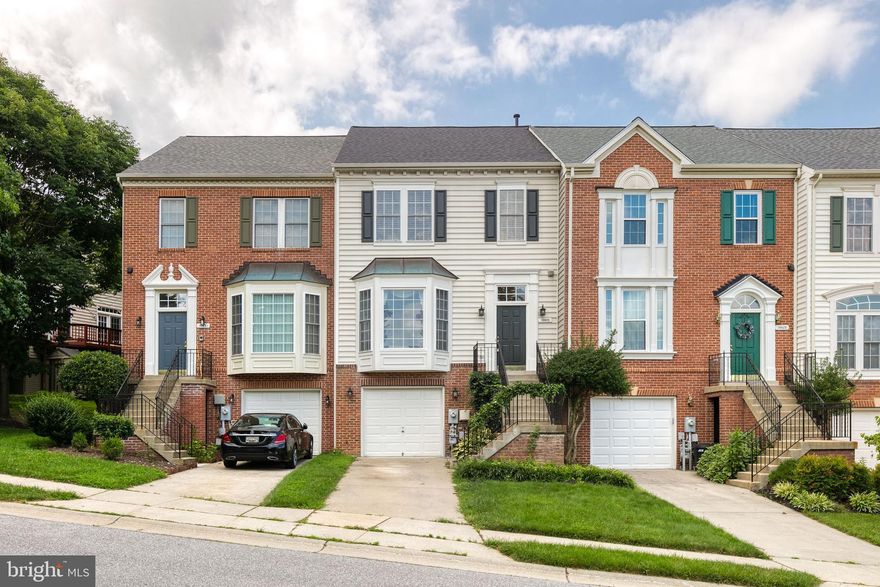 Welcome to the finest that Howard County living has to offer - this pristine townhome in Waverly Woods boasts stainless steel appliances, and spacious living spaces. On the main level, find the cozy living room with bright bay window, powder room, kitchen with breakfast area, and dining area. Just off the dining room is the expansive deck with views of lush greenery. Upstairs find three well-sized bedrooms, including the primary bedroom with a dedicated bathroom with a soaking tub! On the lower level, you'll find a bonus room that could be used as a home-office, playroom, or additional storage space. The lower level also boasts a gas fireplace with built-in shelving, perfect for creating the ideal living room. Just off of this room is your patio, perfect for shaded summertime relaxation. The garage has been converted into a room, there is plenty of space to park in your private driveway. Welcome home!