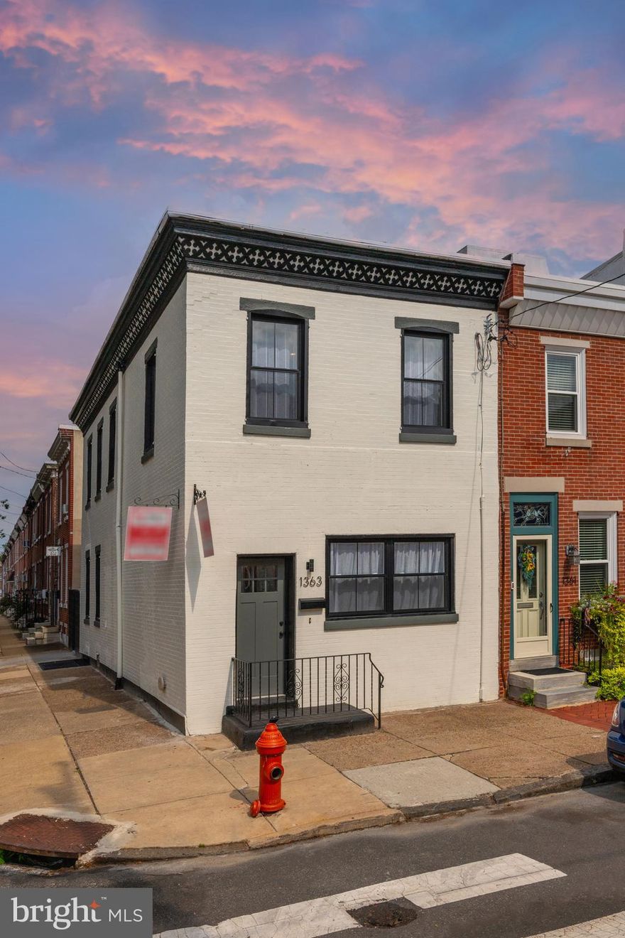 Finally, the Fishtown home you have been waiting for!! 1363 E Susquehanna Ave is an incredible 17-foot-wide corner property located in the heart of Fishtown. This meticulously designed home has been renovated from top to bottom with 3 large bedrooms, 3 full bathrooms, finished basement, spacious yard, and so much more. 10-year tax abatement application pending! Enter the home to be greeted by a completely open layout, with 5-inch-wide white oak hardwood floors flowing from front to back. The living room is adorned with exposed brick which sits opposite a shiplap bump-out complete with an electric fireplace with space heating functionality and a reclaimed wood mantle. Continue through to your spacious dining area sitting beneath a modern two-tone chandelier. The kitchen features white & black shaker style cabinets, herringbone tile backsplash, and Samsung stainless steel appliances. Black and white Calcutta quartz countertops wrap the exterior of the kitchen, with a wood butcher block countertop atop the island, perfect for extra seating and entertaining. The kitchen also features a large and functional pantry, plus a massive and elegant farmhouse sink. Head downstairs to your finished basement with ceiling heights ranging from 7.5 – 8.5 feet and an egress window towards the rear. The finished basement features luxury 12mm thick vinyl plank flooring throughout. The basement boasts a large bedroom perfect for an office or guest room, with a full bathroom featuring jack-and-jill entrances. Head up to the top floor to find a sun-soaked second bedroom in the rear of the home, with massive dual closets. The second upstairs bathroom features a full tub with gorgeous herringbone mosaic design and beautiful penny tiles sprawled across the floor. Just outside the primary bedroom you will find a brand-new stackable GE laundry center and a bonus linen closet. Enter your primary bedroom to be greeted by an extraordinary feature wall, perfect to showcase your king-sized bed. An elegant barn door leads to your walk-in closet with extra shelving and storage on both sides. The primary bathroom is a work-of-art, with white Calcutta quartz tile draping the entire master shower and a sleek sliding glass door. Custom wood double vanity, shiplap feature wall, beautiful black hardware, and a hidden cosmetic closet make this primary bathroom everything you have dreamed of. Head out to the rear of the home to be greeted by your spacious and private rear yard. The entire exterior of the property has been completely restored and the original custom cornice has been brought back to life, making this home truly one-of-a-kind. Situated on a corner, every bedroom and bathroom showcases large brand new windows allowing the natural light to pour in. The width of the home combined with the windows makes this gem feel even larger in person. All permits pulled for new mechanicals with central air and heat, PEX plumbing manifold, and new 100-amp electrical panel with new electrical service line. Located on an amazing block close to both Frankford and Girard Avenues, this home is just a short walk from all the shops, bars, and restaurants that Fishtown has to offer. Rarely does a home with this design aesthetic in such a desirable location come on the market. Book your showing today before it is too late!! Owner is a licensed real estate salesperson in the state of PA.