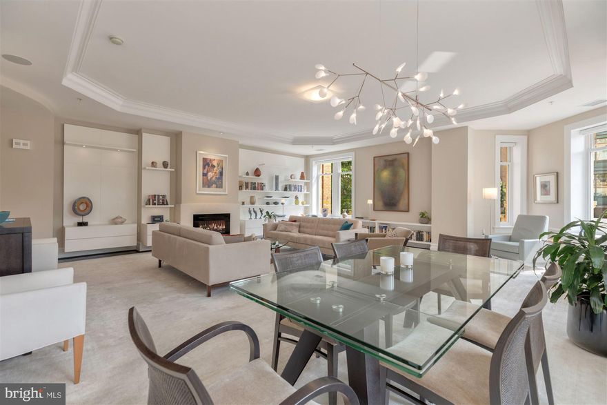 Exquisite, large, sophisticated,  and light-filled  flat with 10 foot ceilings and open floor plan.  2501 PENNSYLVANIA AVENUE is a 16-unit, 2009-built, full service boutique building on the point of historic Pennsylvania Avenue and 25th Street in West End between Downtown and Georgetown.  24/7 staffed front desk. Two parking spaces are included in the bright underground parking garage with extra storage.  Walking distance to Georgetown, Dupont Circle, and Foggy Bottom and its METRO.  Trader Joe's right across the street.  Great high-end cook's kitchen open to large family room  with office nook,  informal dining area and breakfast bar.  Great owner's bedroom suite with  wonderful dressing area plus additional closets in bedroom.   2nd large bedroom also has dressing room and additional closets and storage.  Large, separate LAUNDRY ROOM with Service Entrance.  This apartment is fantastic and has many recent upgrades.  Ask for details and please see  SHORT VIDEO by clicking on Movie Camera Icon at top of page.  FLOOR PLANS attached.