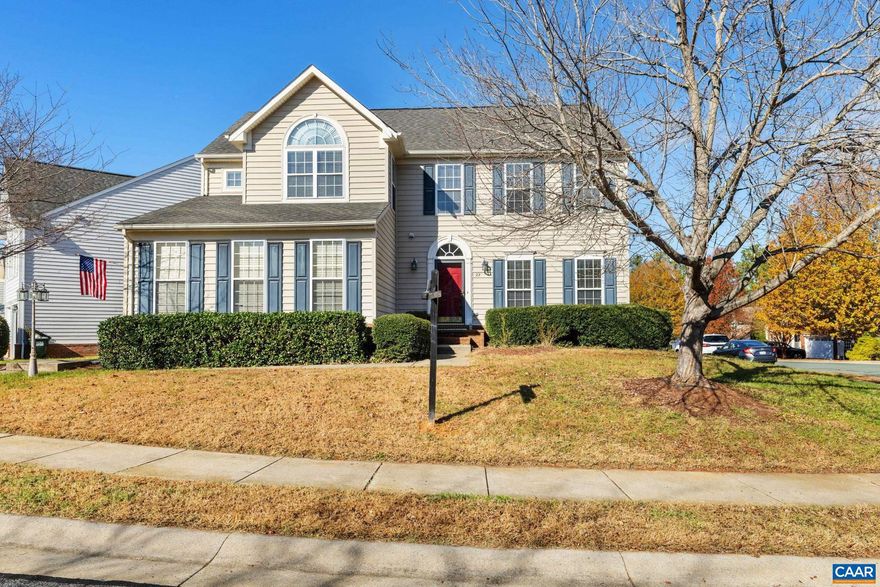 Discover this beautiful two-story transitional home perfectly situated on an expansive corner lot, offering exceptional curb appeal and inviting outdoor spaces. Step inside to a grand two-story foyer, flanked by a formal dining room adorned with hardwood floors, crown molding, and elegant chair rail detailing. The spacious kitchen is a chef?s dream, featuring granite countertops, a large center island, stainless steel appliances, gas cooktop, tile backsplash, bar seating, pantry, and recessed lighting. Adjacent to the kitchen, the bright morning room boasts vaulted ceilings, a Palladian window, and access to the rear deck?an ideal spot for enjoying your morning coffee. The expansive family room offers hardwood floors and a cozy gas fireplace with a decorative mantle, creating the perfect atmosphere for relaxing or entertaining. A first-floor office, accessed through French doors, provides an excellent work-from-home space. A convenient laundry room with access to the two-car garage completes the first level. Retreat upstairs to the luxurious primary suite, offering carpeted comfort, a spacious sitting area with a Palladian window, vaulted ceilings, a massive walk-in closet, and a spa-like en suite bath with dual vanity.