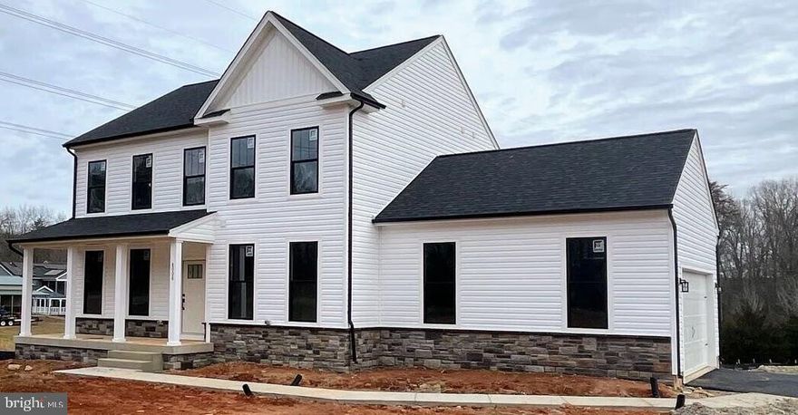 MOVE IN READY! New construction... 2.9 acres ...finished walk-out basement...pond on property...This STUNNING 4 bedroom Haven, by award-winning builder Foundation Homes, offers a perfect blend of traditional colonial and craftsman style elements, complete with a finished basement and a composite deck overlooking a lovely pond.   Step inside from the welcoming front porch into a lovely foyer, flanked by a private flex room with double doors and a spacious dining room leading to the gourmet kitchen. Equipped with high quality shaker-style, white  soft close cabinets, stainless steel appliances, quartz countertops, and a large under-mount stainless sink, this kitchen makes cooking a delight, and the large island leaves plenty of room for eating and gathering. The seamless flow into the eating area, family room, and sun room is illuminated by  an abundance of natural light.  The main level features 9-foot smooth ceilings and waterproof luxury vinyl tile, ideal for active families.  Hardwood oak stairs lead to the second floor, where you'll find all 4 bedrooms and a convenient laundry room.  This beautiful home has a great upstairs floor plan; the owner's suite  boasts 2 walk-in closets, a linen closet, and a gorgeous en suite bathroom with double vanities, a soaking tub, and a tile shower. The additional 3 bedrooms provide ample closet space. The FINISHED  walkout basement has a large Recreation room and a flex room, with 2 unfinished storage rooms that will offer plenty of storage for holiday and keepsake items.   A 12 x 12 composite deck overlooks the backyard and the pond,  perfect for fishing or providing the tranquility everyone desires. This home is located in the sought after Pipe Run subdivision, which is conveniently close to shopping, Route 1,  I-95, downtown, Central Park, Rt 17,  GEICO, and only 15 minutes from the Fredericksburg VRE/Train Station.  Don't miss out on this incredible opportunity – make this home yours today!