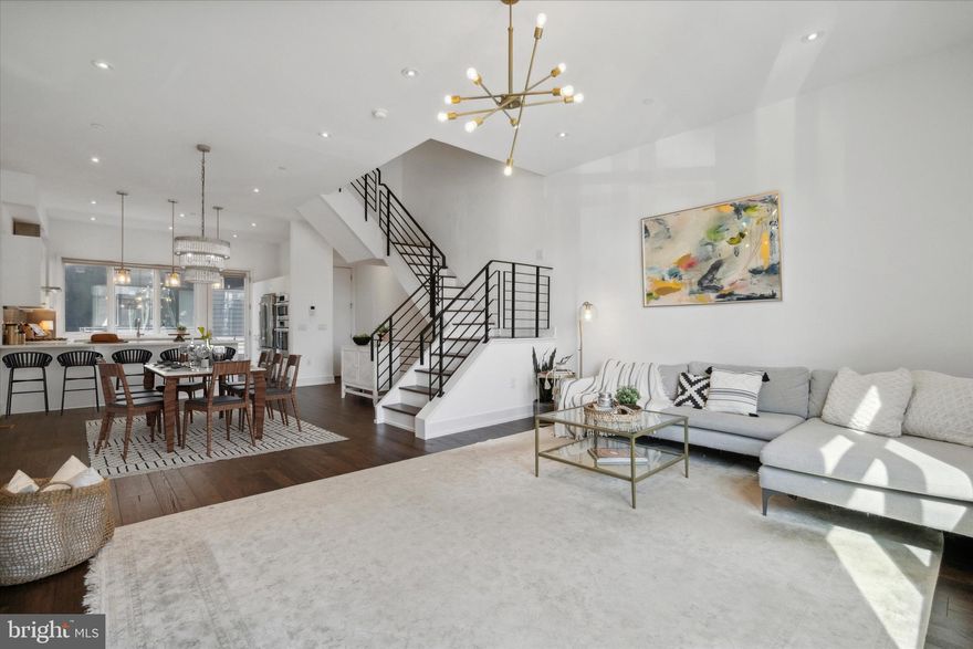 Stunning luxury townhome in the heart of Northern Liberties.  618 N. 5th Street is in Liberty Square which is a gated enclave of private homes. This home features 4 bedrooms, 4 ½ baths, a two car garage, and a rooftop deck offering breathtaking views of the Philadelphia skyline.   Upon entering the home, you will feel the modern vibe with dark hardwood floors and black wrought iron railings leading to the upper and lower levels.  Upon entering the home on the lower level, you will find the first of 4 bedrooms; this room can be used for guests or as a home office.  As you head to the main level of the home you are greeted with an abundance of light and an open floor plan.  This is ideal when entertaining family and friends.  The kitchen features premium appliances, plenty of prep space, and access to a Juliet balcony where you can enjoy your morning coffee.
 
As you move toward the hallway, you will find a beautifully appointed wrought iron staircase leading to the second floor.  Here you will find an open loft that is perfect for a cozy seating area or home office. Adjacent to the loft you will find the second and third bedrooms which both have their own private en-suites as well as second-floor laundry. 
 
The entire 3rd level of the home is the master suite and provides a welcome retreat after a long day.   There is a custom closet system, spacious bed room,and more large windows for plenty of light.  The ensuite is beautifully designed with a large walk-in shower and glass door, sunk in tub, two separate sinks and private water closet.
 
The upper level ( rooftop deck ) of the home is a showstopper with impressive views of the Philadelphia Skyline!
 
ADDED BONUS:
Full finished basement complete with beverage center and full bath!