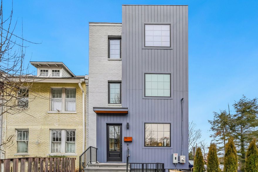 Open Sunday (5/3) 1-3pm! Discover modern luxury living in this exquisite new build in Burleith - one of the top three luxury communities in DC. Just moments from the heart of Georgetown and the shops and restaurants along Wisconsin Ave NW, this new build offers a private rooftop deck with sweeping city views, multiple outdoor spaces, and garage parking. Large windows have been strategically placed to allow light and views from almost every room. The sun-filled, open-concept main level seamlessly connects the living, dining, kitchen, and family room.

The chef-inspired kitchen showcases abundant fine European cabinetry, quartz countertops, and a spacious island. The adjoining family room is centered around a contemporary fireplace with a custom quartz surround, complete with media outlets and art-focused gimbal lighting. Doors open to a rear deck, lawn and private two-car parking with rolling garage doors. A stylish powder room with a custom vanity and fixtures is located off the front sitting room with the coat closet just off the front entry.

Upstairs, four generously sized en-suite bedrooms offer custom closet systems and designer baths appointed with Italian tile, custom faucets, and backlit, anti-fog, dimmable mirrors. The stunning primary suite features a European closet system with integrated LED lighting and a spa-like bath with dual vanities and a soaking tub. Bedroom 4 doubles as a flexible lounge or media/office space with its own wet bar and mini fridge, opening to a private terrace that leads to a rooftop deck with sweeping city views. A dedicated upper-level laundry room with Samsung washer and dryer adds convenience.

The expansive lower level provides additional versatility with a fifth en-suite bedroom, generous storage, and a large recreation room complete with a wet bar, mini fridge, and integrated LED lighting, ideal for guests, an in-law suite, or a home office. The rec room also offers direct access to a rear stone patio and courtyard.

Throughout the home, distinctive architectural and smart features elevate the design, including statement staircases framed by wood-textured columns, light-detecting recessed stair lighting, Amico recessed lights, Emtek hardware and ELEGRP screwless switches, and outlets. Comfort and efficiency are ensured with Honeywell thermostats, two water heaters, and dual-zone Carrier HVAC, along with a built-in Pyle home music system and a dedicated breaker for an EV charging station.

The current list price of $3095M includes garage parking to be built after closing.

This home highlights thoughtful craftsmanship and modern elegance at every turn.
