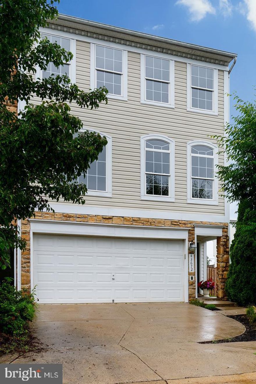 Location, location, location!  Light filled 3 level townhouse.  Hardwood flooring throughout main level, large kitchen w/ island, & breakfast area. Finished walk out basement with full bath and huge fully fenced backyard with zero maintenance turf.  Large deck with stairs (gazebo will stay).  3 spacious bedrooms on upper level. Bedroom level laundry. 2 car garage plus driveway. Available fully furnished for additional fee.