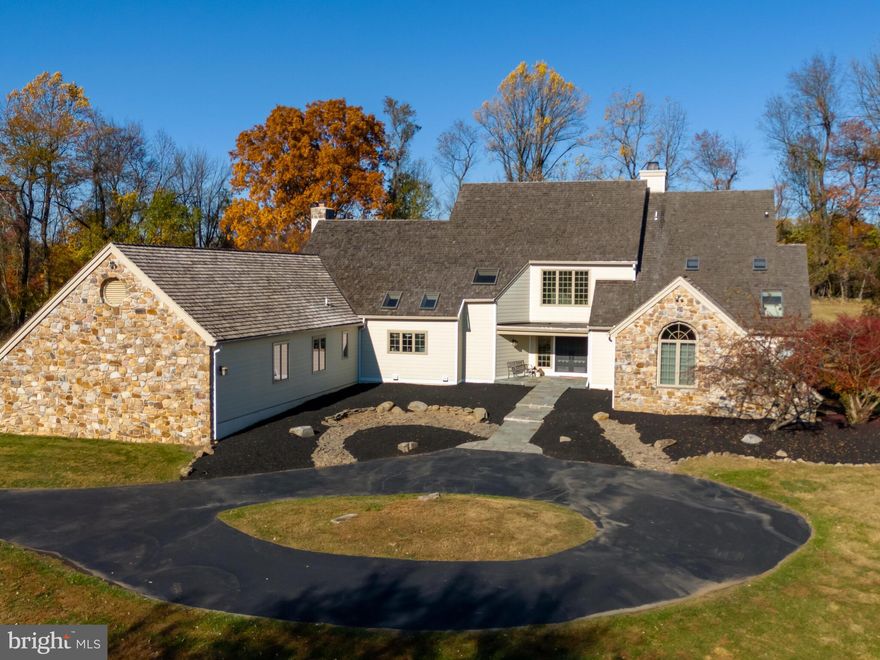 Welcome to 1201 Bassett Lane, a beautiful home nestled in the desirable Pine Creek community of Chester Springs. Offering 4 bedrooms and 3 full baths, this residence blends elegance, comfort, and functionality. As you step through the front door, you're greeted by a grand foyer with soaring cathedral ceilings. Straight ahead, the formal sunken living room showcases a stunning fireplace and is flooded with natural light, creating a warm and inviting atmosphere. This space flows seamlessly into the formal dining room, perfect for gatherings and entertaining. Opposite the dining area, the expansive eat-in kitchen is a chef’s delight, featuring a large island, granite countertops, stainless steel appliances, cathedral ceilings, and abundant cabinetry for storage. Just off the kitchen, the cozy family room includes a second fireplace and a charming reading nook, with double doors opening to the back patio—ideal for effortless indoor-outdoor living. The luxurious primary suite is conveniently located on the main level and boasts its own fireplace, private access to the patio, and two spacious walk-in closets. The spa-like en-suite bathroom is appointed with beautiful tilework surrounding a jacuzzi tub, an updated glass shower, and dual vanities, creating a serene retreat. A private office with vaulted ceilings, beautiful wood accents, and ample sunlight adds flexibility to the layout, while two half baths and a laundry room complete the main floor. Upstairs, you’ll find three generously sized, sunlit bedrooms. One of the bedrooms includes an en-suite bath, perfect for guests or family members seeking added privacy. Outdoors,  the extended back patio provides the perfect setting to enjoy your morning coffee while taking in views of the spacious, open backyard. This home has been freshly painted throughout and features brand-new carpet in all bedrooms, new James Hardie exterior, new HVAC systems, pre-inspected septic and water.  Ideally situated just minutes from shopping, dining, and major commuting routes, 1201 Bassett Lane offers the best of Chester Springs living. Don’t miss your chance to make it your own—schedule your private tour today!