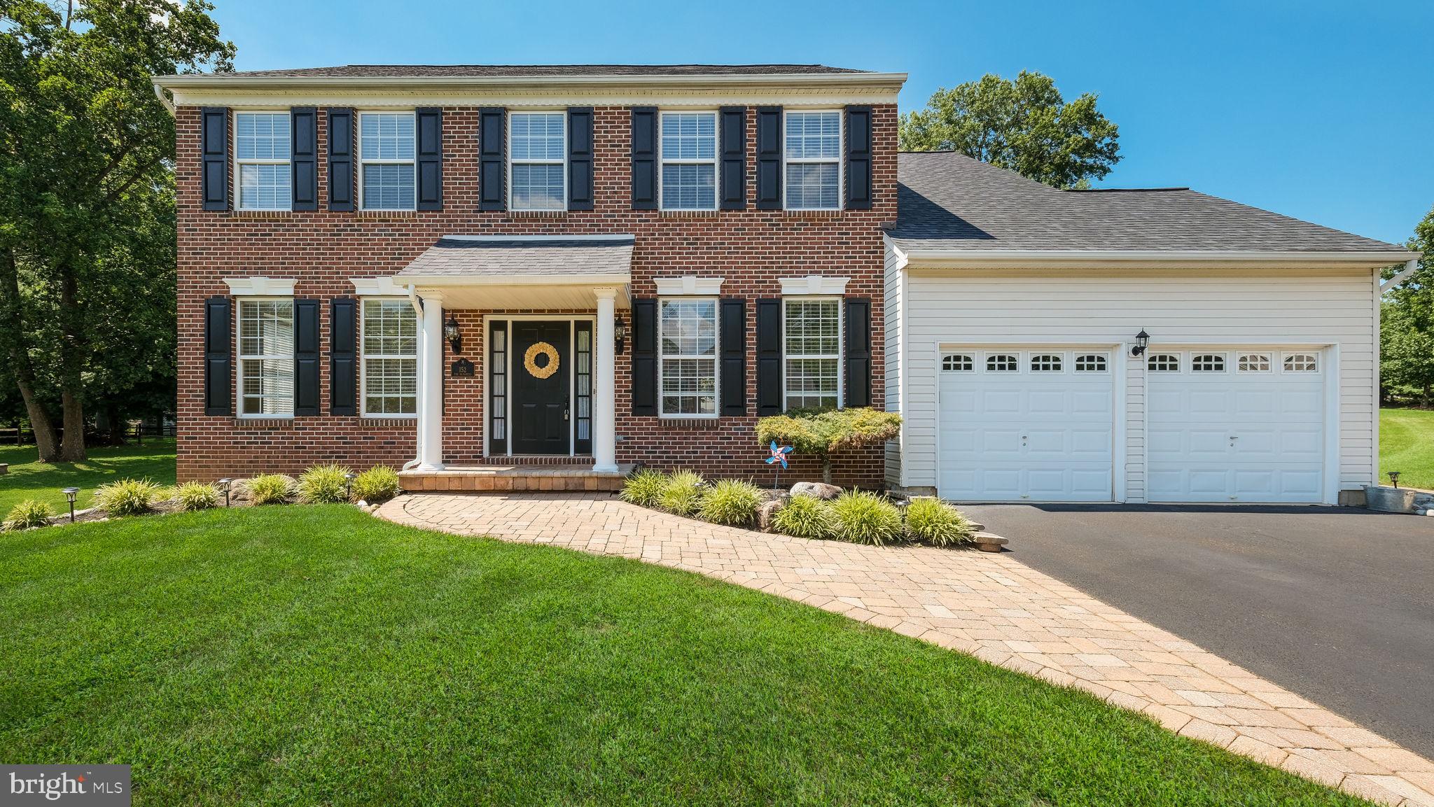 4 Bedroom, 2.5 Bath full brick front, 2-story Colonial in Redstone Woods that features a 2-story Foyer with hardwood floors that continue into the formal Living rm, Dining rm & eat-in Kitchen. The Kitchen offers a center island & an eating room with a slider leading to a custom hardscape patio. Kitchen opens to the Family room with fireplace. 1st floor Laundry rm & powder room. 2nd level features a Primary BR w/ sitting room, 2 large closets & primary bath with double vanity, corner tub & separate shower. 3 additional roomy bedrooms & full hall bath. 2 car Garage, full Basement.