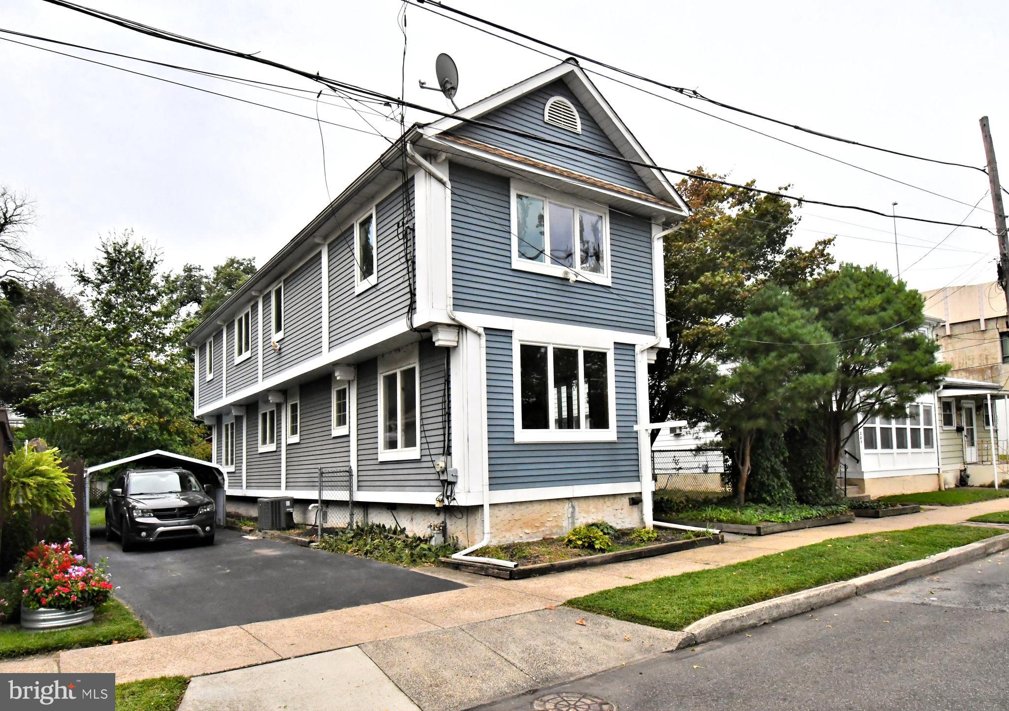 Rare opportunity to own one of only six waterfront properties in Morrisville Borough! This beautifully maintained custom-built Colonial offers 3 bedrooms, 1.5 bathrooms, and timeless charm with thoughtful upgrades throughout, including new carpets and fresh paint. Step inside to a welcoming foyer with woven bamboo flooring, complemented by solid oak trim that flows through the home. The spacious living room features oak flooring with inlaid tile detailing, creating a warm and unique character. The remodeled main bathroom showcases classic subway tile and a walk-in shower, blending style and function. Major updates ensure peace of mind, including a roof (2017), HVAC (2019), Andersen windows and sliding door, and hot water heater (2023). Out back, enjoy the serene setting from your large deck overlooking the fenced yard and built in canopy. A large shed, carport, and off-street parking provide convenience and storage rarely found in the borough. With its waterfront location, quality craftsmanship, and modern updates, this home is a standout find in Morrisville.