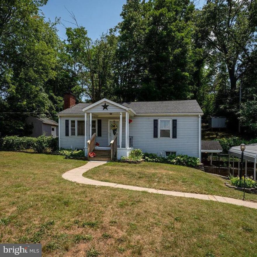 Centrally located on Main Street in the Town of Luray, this inviting 3-bedroom, 2-full bathroom home offers a perfect blend of comfort and convenience. Spanning nearly 2,000 square feet in size, this home features a finished basement, screened-in porch, and detached carport. When entering the home, you will be greeted by a cozy living area adorned with a gas fireplace, hardwood floors, and expansive windows which provide plentiful sunlight throughout the home. The adjacent kitchen boasts a dining area that flows seamlessly into the cozy screened-in porch for hours of entertaining and enjoying the outdoors. Downstairs contains another full bathroom and primary suite, as well as additional storage areas. The property is zoned B-1 allowing for multiple possible uses. With high-speed internet, public water/sewer, and weekly trash collection while being only a short distance from everything the Town of Luray has to offer, this home offers the perfect balance of suburban tranquility and urban accessibility. Make this property your new home today!