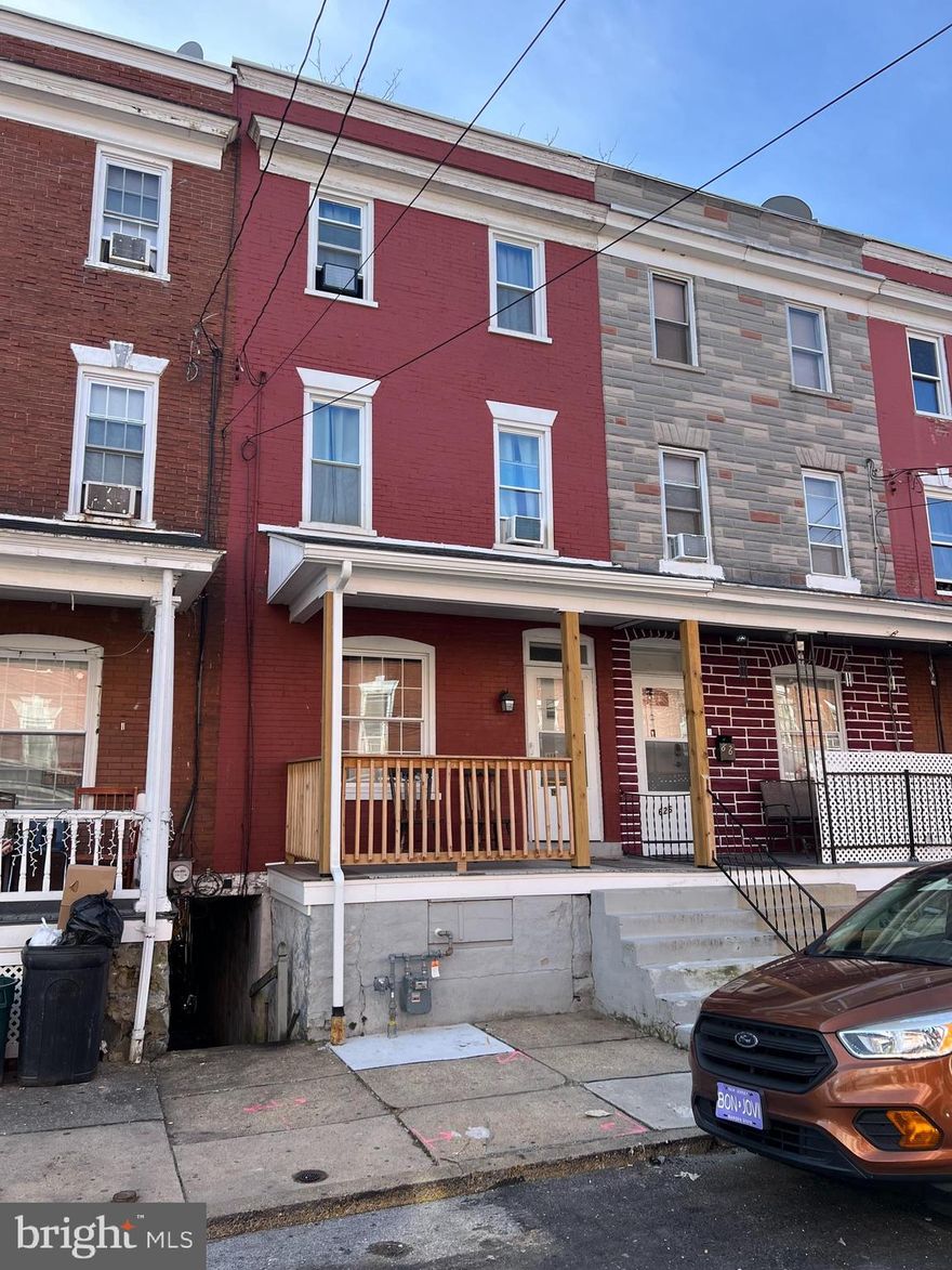 Spacious 4 bedroom, 1 bathroom townhome with updated front porch and kitchen. Off street parking.