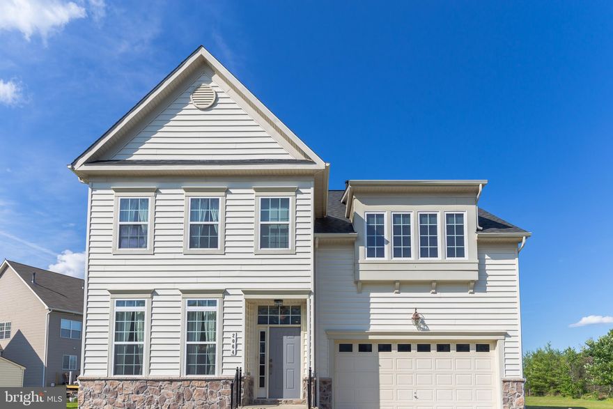 Beautiful Home located on a prime lot in Southern Maryland. This home features an immediate entry into a spacious sitting room with a step up onto the main level that includes the formal dining room with bay windows, a powder room, an open concept kitchen with granite counter tops and stainless steel appliances, New Furnace, an added sunroom that leads out to a customized modern open deck. The sunken family room from the main level also provides a touch of character to make it your own. This home includes a completed basement with a separate entry-way, a media room with double doors, a full bath, and a bedroom with a walk in closet. The second floor includes 1 full bath, 3 bedrooms with walk in closets, a sunken Master bedroom that includes a separate sunken sitting area with a built in bench, a step up onto a separate his & hers walk in closet that leads into the en-suite featuring a luxury bath tub, and a separate toilet room. The home features a 2 car garage with a lengthy driveway, a stone wall waterline, and unique rock garden. In desirably zoned for North Point High School, close with an easy  commute to St Charles Center, DC, VA, National Harbor, Nationals Stadium, Andrews AFB, Pax River Naval Base, Indian Head Naval Base, Joint Base Bolling, Fort McNair, Joint Base Fort Myer, and the Pentagon. *** A MUST SEE!! ****