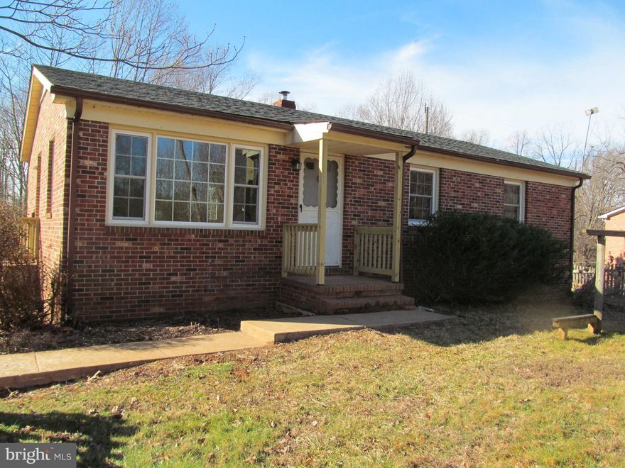 This house has undergone a major rehab, fresh paint, new windows, a new roof, all new stainless steel appliances, and basement refresh and paint.  The basement is well-lit with natural light and would be a great workshop area with a wood stove.  New french doors have been added. The 3 bedroom one bath brick home is solid and heats with a heat pump very well. 2 outbuildings and a paved driveway complete the property. 

Inspection is welcome for informational purposes only, The Owner is a real estate broker.