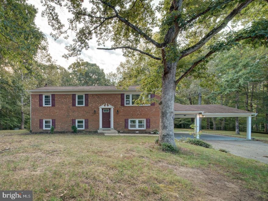 WOW! You’ll be impressed with this gorgeous 3BR/3BA split foyer in move-in condition, offering approximately 2,715 sq. ft. of living space on a 1.00-acre lot in the heart of Hughesville. This home features a carport, spacious layout, and a finished basement with an additional room that can serve as a bedroom, plus a beautiful recreation room. Well-maintained inside and out, it offers comfort, style, and functionality. Enjoy the serenity of a large lot with space for gardening or outdoor activities, while being conveniently close to major commuting routes, shopping, and entertainment. A perfect blend of modern living and country charm—this home is a must-see!