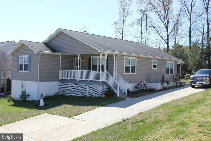 Don't be deceived, this charming rambler offers 3,000+ sq. ft. of living space!  Three bedrooms, two baths, living room. large kitchen/dining/FR, full unfinished basement with a (partially finished) full bath, screened porch , a yard that backs to the trees - PLUS newer windows, French doors, HVAC, dishwasher, washer & dryer.  Just minutes from Pax River and shopping - this home is a must see!