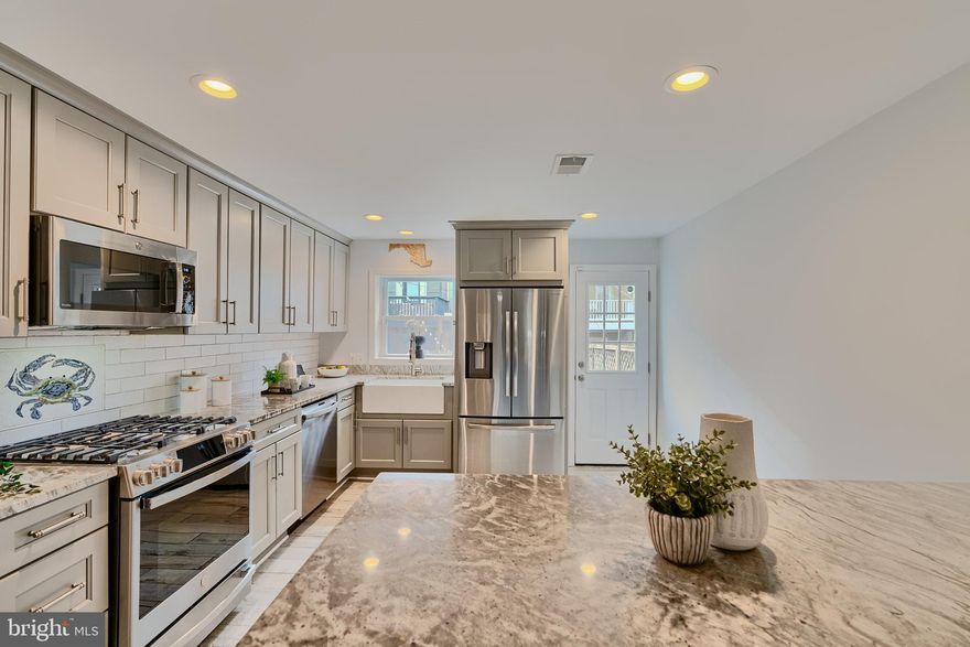 Pride of ownership abounds in this beautifully remodeled, turn key,  2-3 bedroom 2.5 bath home in Prime Patterson park location!  Enter the main level of this stunner to find a bright open living area with 1/2 bath and recently remodeled gourmet kitchen.   Upstairs find two bedrooms, updated bath, and lovely bonus area that can be utilized as an office or any multitude of other purposes.  The lower level offers a family room, or third bedroom option with another updated full bath and unfinished area for storage, workshop, and laundry.  
All a stones throw to Patterson Park, Highlandtown arts district, and a plethora of local shops and restaurants.  Great proximity to JHH, 95 & 895.