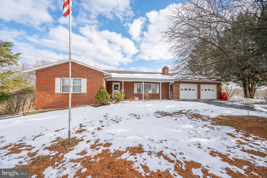 This all brick rancher sits on 1.24 acre lot (final survey will determine the exact acreage) and includes a 2 car, attached garage. On the main level you have a welcoming foyer and large carpeted living room. The dining room features carpet and sliding glass doors to the deck. The kitchen features easy-care vinyl floors, raised panel cabinetry and a large pantry for ample storage. There are three generously sized bedrooms with carpet and a full bathroom. The lower level of the home would be a great in-law suite. There is full bath with laundry, washer and dryer convey. There is a 2nd kitchen on this level, with a Frigidaire range.  It opens onto a concrete patio. The 4th bedroom is on the lower level. There is a storage room for extra space. This home has tons of possibilities. Schedule your showing today!
