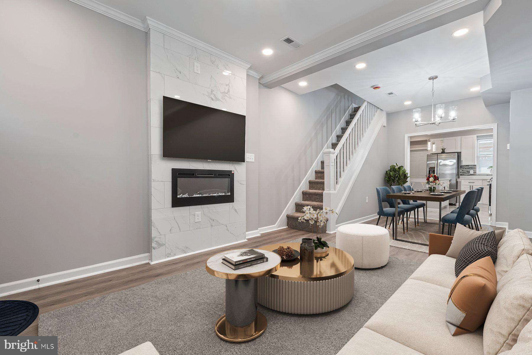 Discover the ultimate in urban luxury in this stunning townhome, perfectly situated in the heart of Baltimore! This beautifully renovated property boasts a complete transformation, featuring new electrical, plumbing, HVAC, and more. Every detail has been meticulously crafted to provide a sophisticated living experience. As you step inside, you'll be greeted by the elegance of the gourmet kitchen, equipped with stainless steel appliances, quartz countertops, and brand-new cabinets. The spacious master bedroom features a walk-in closet, while two additional bedrooms and two full bathrooms provide ample space for family and friends. The main level features a cozy family room with a fireplace fixture, perfect for chilly evenings. Step outside and enjoy the brand-new deck and patio area, ideal for al fresco dining and outdoor entertaining. With its unbeatable location, luxurious amenities, and meticulous attention to detail, this home is a true gem in Baltimore. Convenience is key in this location, with public transportation just a short walk away. John Hopkins Hospital and Darley Park are nearby, and enjoy easy access to shopping, restaurants, and Baltimore's best attractions. Don't miss out on this incredible opportunity – schedule a viewing today and make this house your dream home! Make sure to watch the video provided here. Also for Rent....