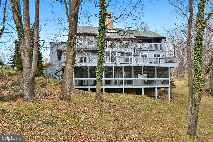 SHOWING FOR BACKUPS-  3 BR , 3 BA Custom Home w/Winter Water Views!  Spacious Beautiful Kitchen w/Center Granite Island & SS Appliances Open to Dining Room.  Vaulted Ceilings, Abundant Windows, Stacked Stone FP.  LL In-Law Suite Complete w/Kitchen, FR w/Fire , BR w/Full BA & Screnned Porch -PERFECT for Aging Parents or Adult Children!Community Boat Slips, Pool, Tennis!  WELCOME HOME