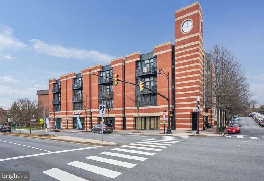 It’s a unique luxury loft condo in Cherrydale, a quiet neighborhood in North Arlington at Five Points: Quincy St, Military Rd, Old Dominion Rd and Lee Hwy.   This contemporary condo is on the quiet side of Langston Blvd in the corner of  the top floor in 38 Place.     

It is spacious with a welcoming foyer, two bedrooms with full baths, lots of closet space, large family room has combo living & dining area adjacent to the galley kitchen, wood floors, high ceilings and floor to ceiling windows make this a pleasant sun filled condo.   Plenty of counter space in the kitchen with maple cabinets and a pantry giving you ample storage, plus the laundry room is next to the kitchen.  The family room has one wall of ceiling to floor window/door with southern exposure for all day natural lighting and walk out to the private balcony with great views.  
Secure building with elevator, handicapped & guest parking.    With this luxury condo you get two reserved underground garage parking spots, a secure storage unit and bike rack for the residents.  Multiple commuter options; walking, bicycling, bus stop at building, near metro stops, commuter lots, short commutes to airports and it’s only ½ mile off I66 (exit 72). This great location means you rarely need to make a long drive anywhere because it is in walking distance or a short commute to parks, trails, shopping, entertainment, restaurants, fitness centers, historical sites, hospital, museums, DC, and many other options for your enjoyment from while living in this beautiful luxury condo in the desirable Cherrydale community of Arlington.