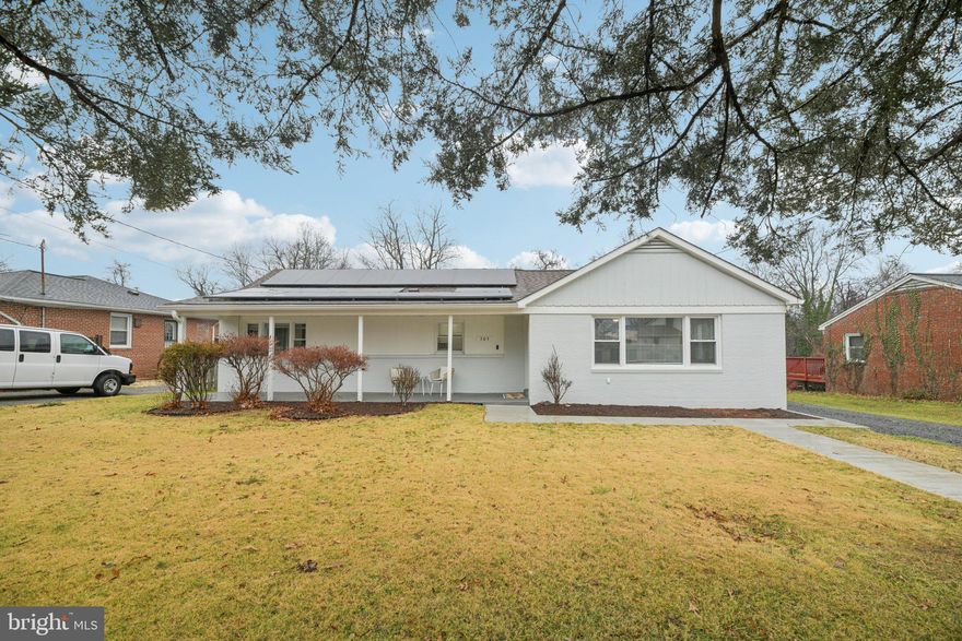 Beautifully renovated throughout, this home offers 4 bedrooms and 2.5 bathrooms. Enjoy the open floor plan, updated kitchen, a primary bedroom with  en-suite bath, living room with fireplace. Recent updates include new flooring,  new oven, and custom closet designs throughout. Enjoy outdoor living in the enclosed porch and on the deck, plus the convenience of a huge detached garage with electricity. Ideally located close to public transportation, new restaurants, and local amenities—this property truly has it all. Welcome home!