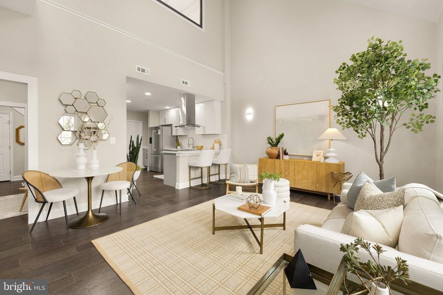 Three Bedroom Home available in the Heart of Old Town!  
Experience the epitome of urban elegance at 1229 King St, a boutique collection of just 12 exclusive residences that combine sophisticated design with unparalleled convenience. Nestled on the iconic King St, these condos offer the ultimate lifestyle in the heart of Old Town, where fine dining, boutique shopping, and vibrant city life are right at your doorstep. With the metro just a short stroll away, your commute has never been easier!
Take the private elevator up to Residence 405 and be greeted by a spacious, light-filled sanctuary perfect for both relaxation and productivity. This stunning corner home features a chef’s kitchen that’s sure to impress. Enjoy cooking in a beautifully appointed kitchen with custom wood cabinetry, sleek quartz countertops, and Bosch appliances, all illuminated by under-cabinet lighting.  From the wide plank flooring to the LED recessed lighting, every detail in these condos has been carefully curated to offer a seamless blend of luxury and functionality. And with solid concrete construction, you’ll enjoy peace and quiet in your private retreat. This residence includes a secured, covered parking space, adding an extra layer of convenience to your urban lifestyle.
Head up to the community rooftop deck, where you can entertain guests or simply relax while soaking in the breathtaking views of Historic Old Town. Whether you’re hosting friends or finding a moment of peace, this rooftop oasis is the perfect extension of your living space.
These exclusive residences are selling fast.  Schedule your private tour today and take the first step toward living your dream in the heart of Old Town!  Builder is offering 1 year of condo fees!