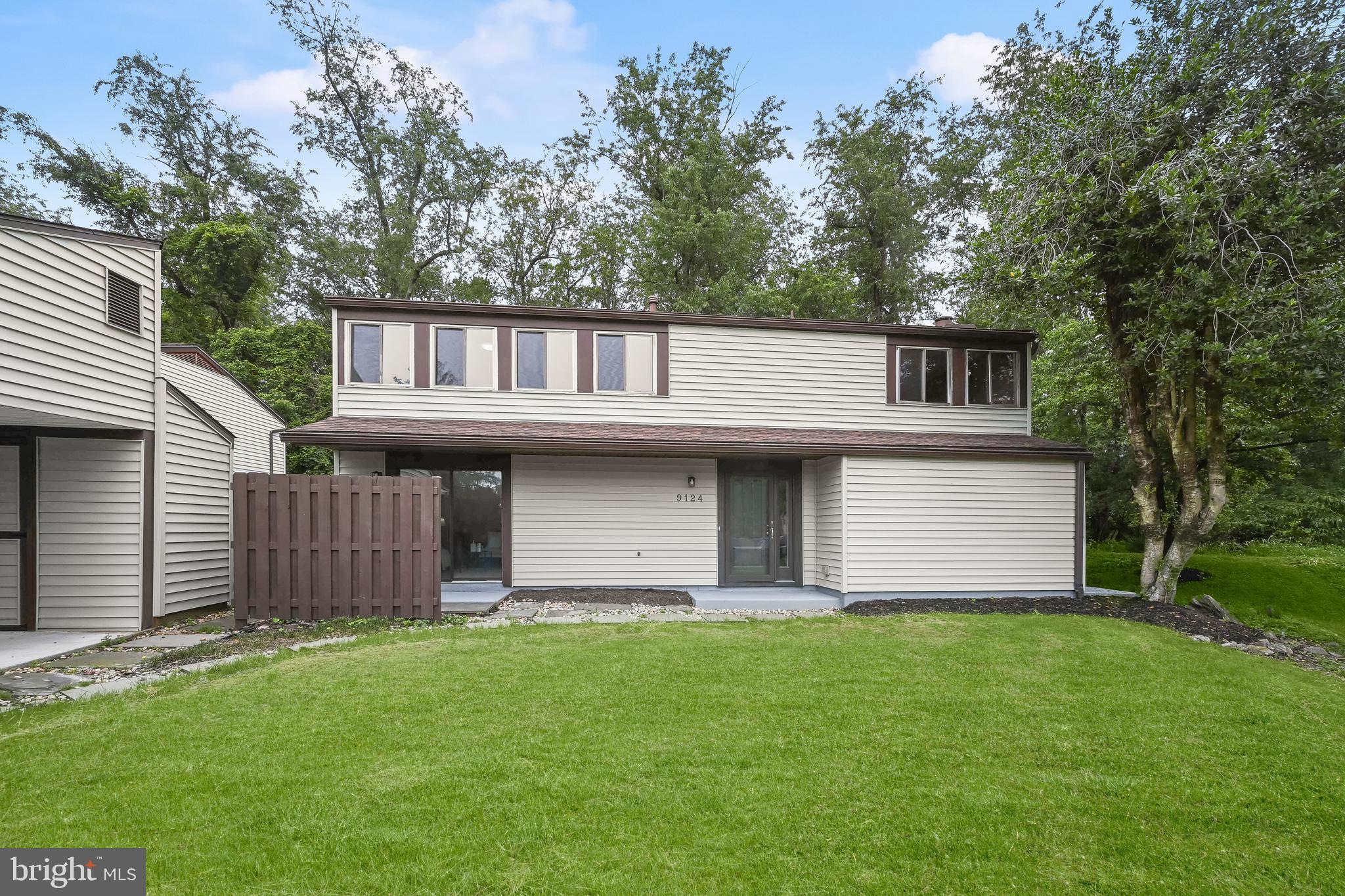 Beautifully renovated home on a quiet cul de sac in the heart of vibrant Columbia, perfectly situated on a wooded lot offering privacy and serene views. This home boasts updates throughout including a fresh modern paint color and new luxury vinyl plank flooring throughout, along with fully renovated bathrooms and kitchen, a new hot water heater, upgraded 200-amp electrical panel, modern lighting package, and more. The sun-filled open floor plan features spacious living and dining areas with contemporary finishes and a design inspired lighting. The chef’s kitchen features soft-close cabinetry, granite countertops, stainless steel appliances, and access to the deck, ideal for indoor-outdoor living. A main level laundry room adds everyday convenience. Ascend the stairs to the expansive primary suite offering a sitting area and an en suite bath beautifully updated with decorative tile accent. Three additional generously sized bedrooms and a renovated hall bath complete the upper level. Enjoy all the amenities of Columbia with easy access to major commuter routes and nearby shopping, dining, and entertainment, this move-in ready home has it all!