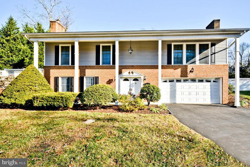 Appraised $465K!  Updates galore!! Roof, siding gutter guards.Newer Anderson double pane wndws and slider to deck. Water heater - 1 yr., Inside HVAC unit -5 yrs. Kitchen updated with ceramic tile, Corian counters and SS apli. Master bath completely new, with Kohler fixtures! 2 fireplaces, Beautiful, expansive deck! Full house intercom. Access to community pool, club house, tennis court& playground