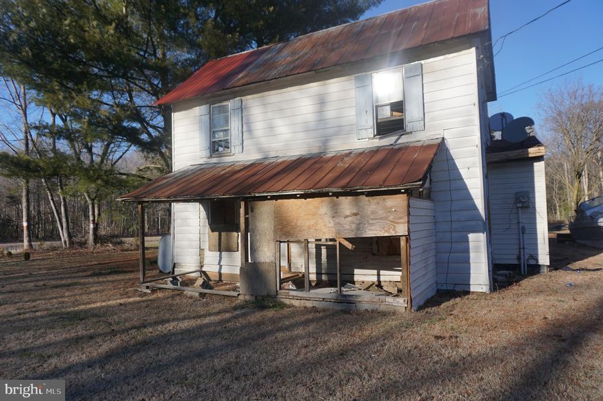 Create your own private property with this 2-bedroom, 1-bathroom. Sitting on a 2.93-acre lot surrounded by trees. Lots of outdoor space for gardening, recreation, that includes a 30x40 pole barn providing ample storage space for tools, equipment, or hobbies. The pole building has electric to it . The existing well and septic system are in unknown condition. Many endless possibilities await you here at 25782 Goldsboro Rd.