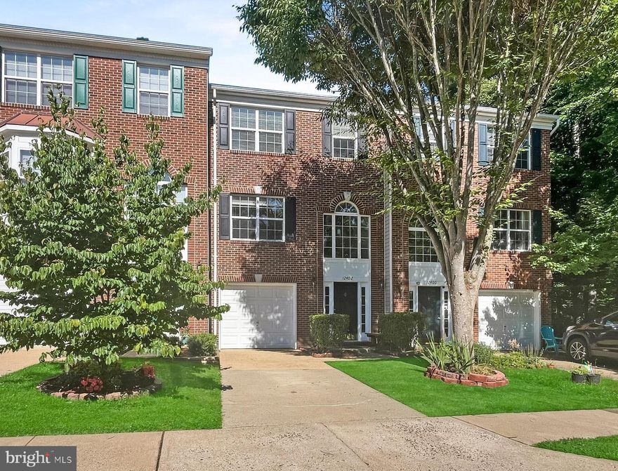 Welcome to this inviting and light-filled brick-front townhouse with a convenient 1-car garage. This home offers 3 comfortable bedrooms and 3.5 bathrooms, providing ample space for everyone.The spacious eat-in kitchen features an island and opens out to a deck with stairs leading to a beautiful private patio, perfect for outdoor activities. The spacious primary bedroom is highlighted by a vaulted ceiling, walk-in closet and ensuite luxury bathroom with a separate shower and soaking tub. The lower level offers a cozy family room with a fireplace and access to the patio and fully fenced rear, which backs to a peaceful wooded area. Visitor parking is available, and the location is convenient to shopping, dinning, recreation,  I-95 and public transportation. This home combines comfort and convenience in a great location. Rent includes trash removal, Water, and Sewer.