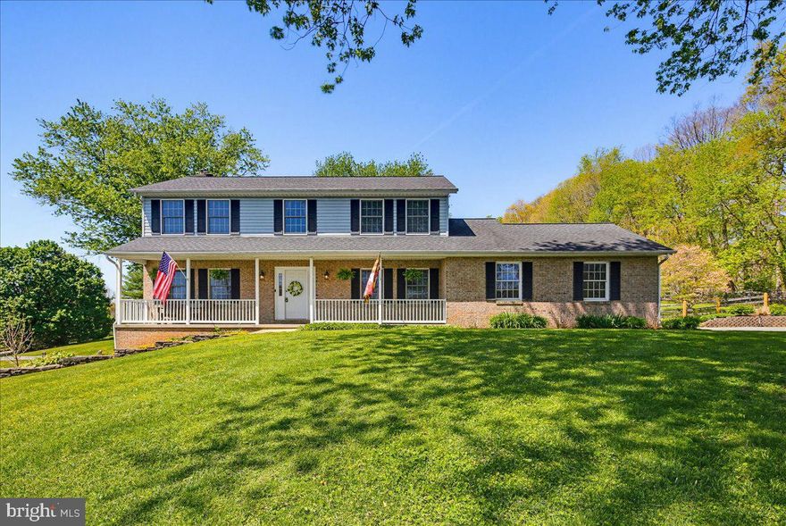 Set on 3 scenic acres in the highly sought-after Hereford Zone, this exceptional property offers the perfect blend of comfort, space, and outdoor living. With over 3,000 square feet, the main level features beautiful hardwood floors and a warm, inviting family room with a wood-burning fireplace, seamlessly connected to the updated open kitchen. The kitchen boasts granite countertops, stainless steel appliances, a spacious pantry, and a sunny table area. The main level also includes a private dining room, a flexible living room ideal for a home office or study, a powder room, and a convenient laundry room. Upstairs, the primary suite offers a peaceful retreat with a full bath and walk-in closets, while three additional bedrooms share a well-appointed hall bath with a tub. The finished lower level expands your living space with a wet bar and wine fridge—perfect for entertaining—along with a gathering area, full bath with walk-in shower, workshop, and abundant storage, including a 12x15 climate-controlled room. A walk-out provides easy access to the side yard. Step outside and enjoy the impressive 22x40 patio with Techo-Bloc pavers, ideal for relaxing or hosting. The fully fenced backyard features oak board fencing with coated wire—perfect for pets—plus a separate fenced garden area complete with a greenhouse offering electricity and water access. Artists, hobbyists, or entrepreneurs will appreciate the detached 24x24 workshop with concrete floors, insulation, electric, and water. The expansive driveway offers ample parking and doubles as a space for basketball or pickleball. For outdoor lovers, the location is unmatched—walk directly across the street to access scenic trails leading to Prettyboy Reservoir. Enjoy hiking, trail running, dog walking, bird watching, fishing, boating, and more, right at your doorstep. This is more than a home, it’s a lifestyle you won’t want to leave.