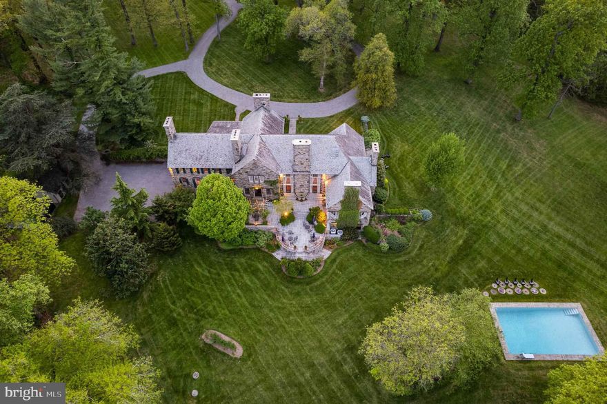 Live authentically. Magnificent stone estate tucked away overlooking Worthington Valley and beyond. Upper Melinda awaits perched on 235.00+/- acres. Commanding views of the valley complement the strength  grandeur of this enduring architectural masterpiece. Relish the meandering drive home through lush  woodlands. A sanctuary of tranquility and serenity. Crafted by acclaimed architect Louis McLane Fisher and adorned by the legendary Baltimore native, Billy Baldwin. Discover the whispers of Baldwin’s timeless touches lingering in dashes of red lacquer accents and smokey mirrors throughout. Within,  nine roaring fireplaces beckon conversation and radiate comforting warmth. Main level owner’s suite. Transform your nocturnal journey as you gaze across the valley before falling into restful slumber. Your inner chef will flourish in the cooking space. Partake in lighthearted fun and competition in the basement game room. Original cork flooring embellished with exotic animal inlays; intact. Immerse yourself in the opulence of rich landscaping as you explore your outdoor haven. Savor the stillness and go for an invigorating round of laps in the sublime pool..  Recharge in the ambiance. An expansive stone terrace embraced by abundant greenery beckons for an elevated outdoor dining experience. Other worldly views that are hard to grasp.  A palpable depth of wonder permeates.  A sensory experience. Vistas that mirror paintings. Gaze over glistening ponds in the distance. Truly a living canvas from which to paint the next chapter of your life. A legacy property. 5 +/- miles of  extensive trail network throughout the grounds. Revel in the extreme privacy.  Indulge in the vast beauty that unfolds around you. Enchanting stone guest house recently renovated.  Four income generating tenant houses convey that are unable to be divided. Cultivate your existence. The art of uniting human and home. Do not drive to property without an appointment. Property is subject to conservation easement.