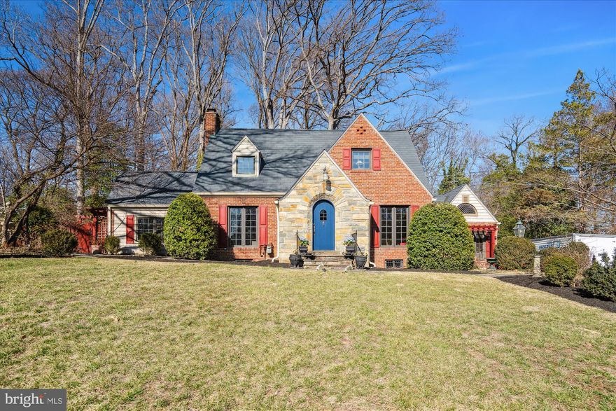 Open House March 29th 1-3. Picked by Urban Turf as one of the best listings of the week!!Welcome to timeless perfection. This spectacular home situated on a three quarter acre lot combines the charm and character of a bygone era with spacious living for modern families. Step through the bespoke front door into light flooded great rooms with floor to ceiling windows. A beautiful gas fireplace warms the living-room. Enjoy working in the architecturally stunning den, overlooking the gorgeous grounds surrounding the home. The back of the main level boasts a fantastic open floor plan kitchen/family room with a traditional brick fireplace and access to the deck overlooking the sprawling backyard. Also on the main level is a primary suite! Upstairs are two of the most charming, cozy and large bedrooms. The full bath upstairs has been lovingly updated, while retaining the one of a kind original fixtures. The lower level has a finished family room and a large storage/laundry room. Completing the home is a fully finished studio/workshop just off of the breezeway. The added touches are too numerous to list but include, antique shutters, custom plaster ceiling medallions from Giannetti Studios (plaster restoration specialist to the White House and Mount Vernon), antique armoire doors entering the studio, and so much more. Don’t miss your opportunity to live in one of the Grand Dames of Old Hillandale!  Recent improvements include: 2025 new carpet in family room and basement rec room, deck painted, upper level bathroom updated. 2019 new roof.  Convenient to University of Maryland, FDA, 495/95, shopping and restaurants.