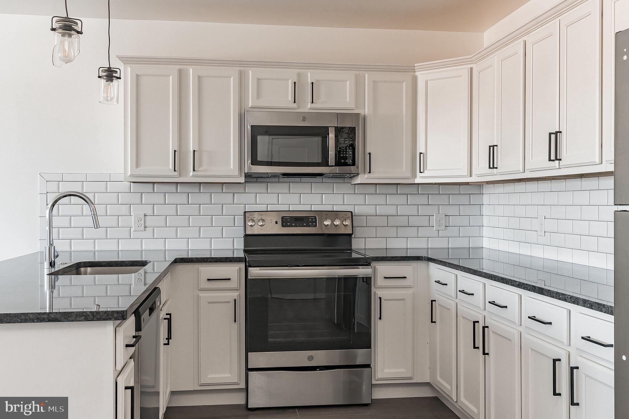 Available now! Modern one-bedroom in a new construction apartment community. Located along Roxborough's vibrant Ridge Avenue corridor, convenient to shopping, dining, transit, and more! Your new home includes easy-to-clean vinyl wood plank flooring, custom granite countertops, and large windows that let in tons of natural light. Stacked washer & dryer in the apartment with dishwasher & garbage disposal make chores a breeze! Stay comfortable year-round with individually controlled PTAC Climate Control in each room. All residents at Lilac Pointe can access the green roof deck, resident lounge, and fitness center for no additional charge. Plus, we are pet friendly with NO FEES! Apply today- this home will not last long!