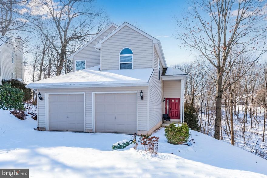 This adorable cud-de-sac setting home, on nearly a .50 acre of wooded setting, sets the stage for your expectations.  The location is so close to all conveniences, yet will give you such a private and serene feeling. A 2-level deck overlooks this private backyard w/ wildlife and views.  The kitchen is stunning w/ under mount lighting, tiled backsplash, gorgeous cabinetry, SS appliances and plenty of room for a gathering table. Dining room is quaint w/ an electric fireplace and windows overlooking this beautiful yard. The living room has a vaulted ceiling and access to the deck. The primary BR is spacious w/ a walk-in closet and primary bathroom w/ a double vanity and new mirrors. Looking for a gaming room or media room, this basement is perfect for that!  It has been finished w/ an additional 375 sq. ft. and also has plenty of storage.  This is an exceptional home!  The HOA fee gives access to the community pool too!