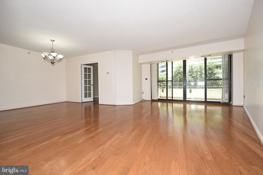 Superb location in Crystal City! Enjoy the refurbished wood floors in the main living space and plush carpeting in the Master Bedroom. Large marble master bathroom with soaking tub and separate shower. Light & bright w/ walls of windows, great views off your private balcony. Full service bldg w/24 hr concierge, fitness center, pool. Just steps from beautiful 33 acre Longbridge Park. Metro indoor walking path connected from this building, 0.3 mile fun walk, Enjoy indoor & out door pool, Owner pays condo fee. Tenant pays only electric and cable/internet. 1 underground garage parking space conveys with the unit. Pet free building.