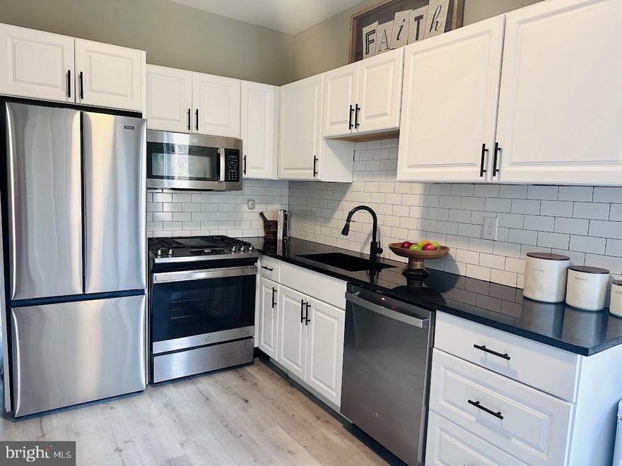 Welcome to Upton! This new completely renovated, spacious 2 level unit features 2 bedrooms, 2 full baths,  a separate dining room, living room, kitchen, with hardwood floors throughout.  The gorgeous kitchen features all stainless steel appliances including a French door refrigerator, custom backsplash,  plenty of cabinetry & counter space, and a large deck. The second level features a spacious primary bedroom,  a 2nd room that can also be used as office or den,  and a full bath. Large windows throughout the home with plenty of natural light. Water and Internet INCLUDED! One block away from small dog park. Just under 2 miles from M&T Ravens Stadium, University of MD and UMD Medical Center, Orioles Park/Stadium and More! Schedule your showing today!