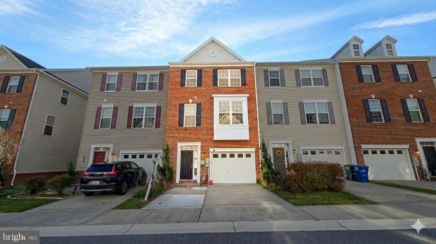 Beautiful 3 level, brick front townhome with 3 bedrooms, 2 full baths and 2 half baths. The open floorplan features high ceiling and a spacious gourmet kitchen w/island and stainless appliances. Deck off the kitchen looks overlooks the park. 1-car garage plus room for 2 more cars in the driveway. Close to I95, BW Pkwy, Rt. 100, Ft. Meade/NSA.