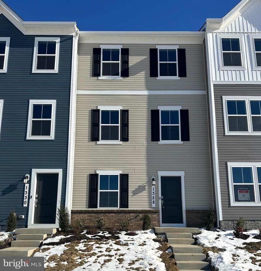 Welcome to Red Clover Meadows – A Modern, Convenient Community in Ranson, WV

Discover the Lancaster Townhome, a brand-new, never-before-lived-in home in a peaceful yet ideally located neighborhood. Red Clover Meadows offers a perfect blend of suburban tranquility and easy access to dining, shopping, parks, and historic landmarks, all just minutes away. Plus, with quick access to major commuter routes, this is the ideal place for modern living.

This Lancaster townhome is thoughtfully designed 3-level townhouse features 3 bedrooms and 2.5 bathrooms, offering plenty of room for both relaxation and entertainment.

Main Level: The entry level welcomes you with a versatile recreation room, ideal for a home office or cozy lounge. You'll also find a convenient powder room, plus access to a 2-car garage with rear entry for added convenience.

Living & Dining Areas: Head upstairs to an open-concept main floor that includes a spacious Great Room, a dedicated dining area, and a gourmet kitchen perfect for cooking and entertaining. The kitchen is a chef’s dream, featuring beautiful Valle Nevado granite countertops, soft-close Barnett DuraForm cabinets in Linen, and modern appliances. Step outside to your 10x18 deck for outdoor relaxation or entertaining.

Top-Level Bedrooms: The upper floor is home to all three bedrooms, including the luxurious owner’s suite. This private retreat boasts a large bedroom, an en-suite bathroom with stylish finishes, and a walk-in closet designed for your wardrobe.

The Lancaster Townhome offers the perfect blend of style, comfort, and convenience—ideal for modern living. Plus, the landlord has added new blinds throughout the home for added privacy.

For more details or to schedule a tour, contact Tawny Zuniga at 830-279-9551.