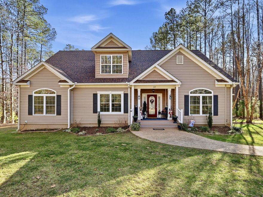 This home has it all!  Single Level Living with guest suite and recreation spaces upstairs, Lake Access with a Deeded boat slip, Average utility costs of only $225/month (elec/propane), on the Private side of Lake Anna! This home has been built, maintained and improved with the highest standards in mind including a new roof, new heat pump, solar (fully owned no lease!), and a whole house generator!  The home provides 3591 square feet of living space, sited on 4.98 acres. The coveted community of “The Waters” has abundant amenities including a pool, boat launch, covered picnic areas, marina, club house, beach area, tennis/pickle/basketball, playground and it’s golf cart friendly! With fresh neutral paint, this home is move-in ready!  The main level is open concept, with 9-foot ceilings, hardwood floors, and upgraded millwork.  The kitchen features a spacious island, granite counter tops, stainless steel gas range and opens to dining, screened porch, family room area and deck access.  There are three main level bedrooms including the owner’s suite with 2 walk-in closets. The primary bath has a soaking tub, stall shower with new glass doors, two vanities and a water closet.  
The upper level has wood floors, the 4th bedroom, a full bath, entertainment area and a spacious recreation room.  There is a utility area with a sink that could be a kitchenette or wet bar.