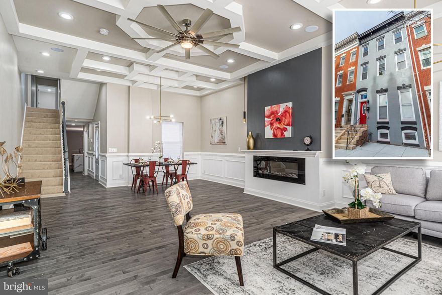 BEYOND SPECTACULAR RENOVATION WITH 4 FINISHED LEVELS AND 2 CAR PARKING!  Open floor plan featuring a spacious living room with coffered ceiling, fireplace, and dining area, gourmet island kitchen with Quartz counters, ss appliances, and a walk-in pantry, main level half bath, 2nd level with 3 bedrooms, 1 full bath, and desirable bedroom level laundry, expansive 3rd level Primary suite with vaulted ceiling, walk-in closet and a spa bath with double sinks & a whirlpool tub, a fully finished basement with a media room, 5th bedroom, a 3rd full bath and an abundance of storage space, and 2 car off street parking!  Property is eligible for 10k Vacants to Value grant!  Conveniently located close to downtown Baltimore, UMMC, stadiums, and major roadways!  Same builder has other units available for pre-sale - call Listing Agent for details