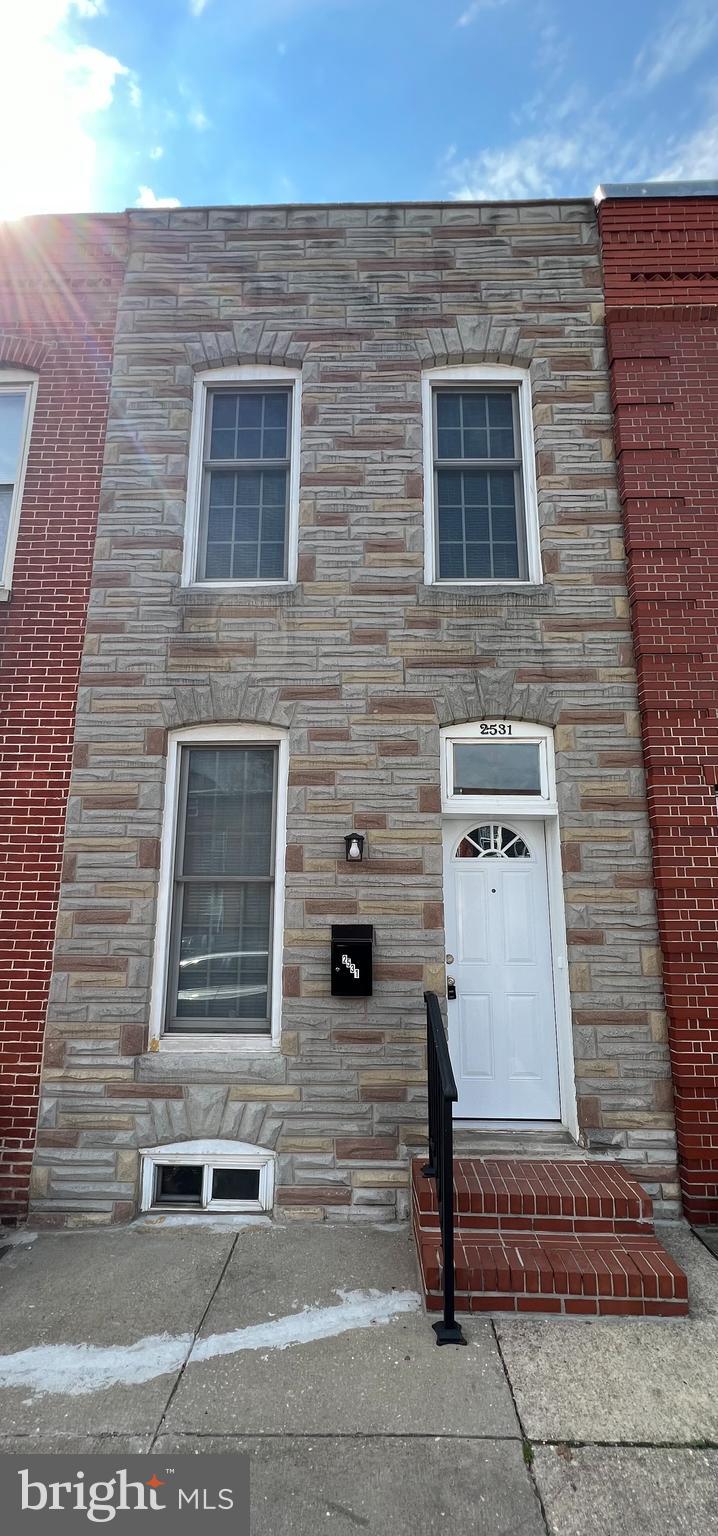 This ideally located Canton Rowhome has been completely renovated and is move-in ready! Fresh flooring, lighting, paint, updated kitchen and stainless steel appliances, updated HVAC, water heater, washer/dryer. PLEASE NOTE that the 2 bedrooms upstairs are tandem bedrooms, meaning you have to walk through one to get to the other. There is a bonus room upstairs that could be used as an office for anyone who works from home. The basement is mostly unfinished, however, it has been waterproofed and has fresh, redone flooring along with an updated washer and dryer. If you're interested in city living, come check out this beautiful rowhome and contact the listing agent for the link to apply!