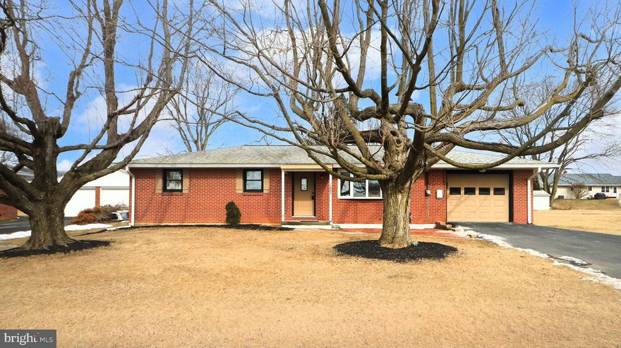 All-Brick Ranch in a Prime Bellefonte Location!  If convenience is at the top of your home search, this delightful all-brick ranch is a must-see! Located directly across from where the new Bellefonte Elementary School is being built & just 1.2 miles from I-99, this home offers easy access to I-80 plus a quick 12-mile commute to Penn State University. Nestled on the outskirts of historic downtown Bellefonte, this solidly built home sits on a flat .26-acre lot, offering a blend of small-town charm in a great location.  Step inside to a light & breezy living room, where hardwood floors & a large bay window invite in abundant natural light. The darling eat-in kitchen features new laminate flooring, comes complete with included appliances, sufficient cabinetry for storage & ample countertop space, making meal prep a breeze. Down the hall, you’ll find new flooring, 3 comfortable bedrooms & a full bathroom with updated flooring.  Need extra space? The partially finished basement is ideal for game day gatherings, with a dedicated laundry area (washer & dryer included!) & unfinished space for all your storage needs. Additional highlights include fresh interior paint, replacement windows, radon mitigated, oil hot water baseboard heat, an included shed, attached 1-car garage & plenty of off-street parking.  Moments away from the High School & Middle School, just 1 mile from downtown Bellefonte, you’ll love being so close to some excellent local eateries, unique shops & scenic Talleyrand Park. Whether you’re starting out or starting over, this cozy home could be your perfect match!  Don’t miss out—schedule your showing today!