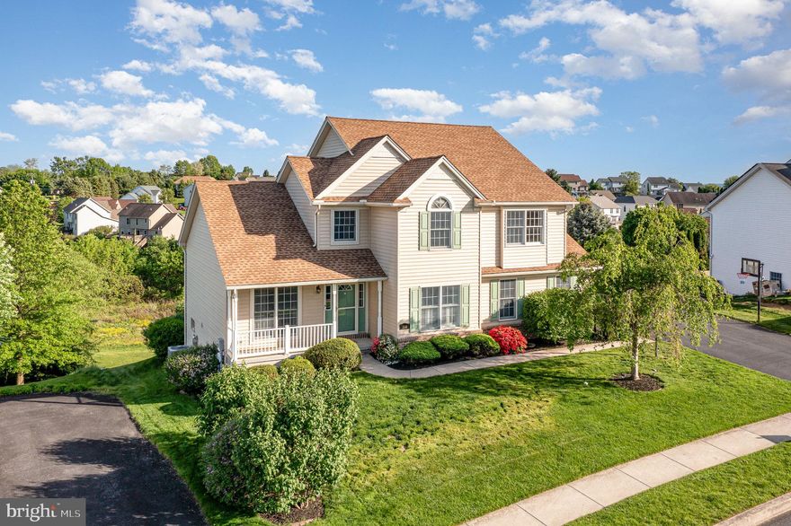 Welcome to this beautifully maintained home featuring an dream backyard with an inground fiberglass pool, paver decking, and a spacious paver patio. Unwind in the outdoor hot tub or host summer gatherings on the expansive 12' x 35' Trex deck.

Inside, the partially finished basement offers a cozy family room with a gas fireplace, a large wet bar, refrigerator, wine fridge, two TVs, and a convenient half bath — perfect for game nights or casual entertaining.

Upstairs, enjoy a gourmet eat-in kitchen equipped with quartz countertops, a large center island, and plenty of space for family meals and hosting guests.

With four spacious bedrooms and plenty of indoor and outdoor amenities, this home seamlessly blends comfort, style, and functionality.