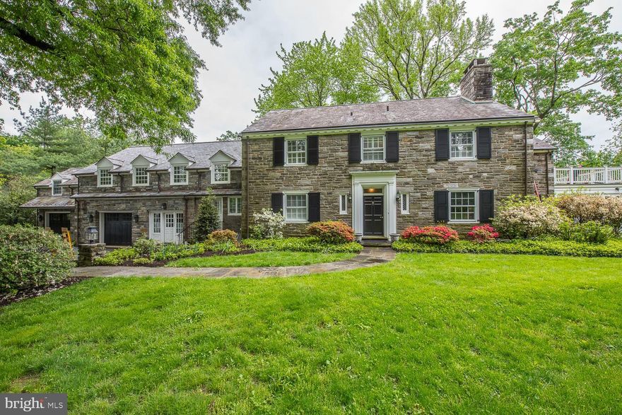 Classic stone colonial set on two and a half bucolic acres, 1044 Stony Lane has been tastefully renovated and professionally decorated throughout using the finest materials and high end finishes creating a one of a kind masterpiece. The location, across from Philadelphia Country Club, overlooks acres of privacy while offering a convenient commute to the city or to many Main Line attractions. Beautiful kitchen with wood cabinetry, granite counters, large butcher block island, built in sub zero refigerator, wine refrigerator, double ovens, microwave oven, and 5 burner Thermador range. Large breakfast room/sitting room adjacent to the kitchen includes built in desk and bar area. The kitchen also overlooks a two story family room with fireplace and access to the slate terrace. Handsome paneled library/office with fireplace. Spacious formal dining room and large living room each boast a fireplace. Off the living room is a slate floored sunroom overlooking the grounds and pool. Second floor master suite with his and her baths, dressing area. Two additional bedrooms with on suite baths. Rear hallway has two more bedrooms, hall bath, laundry and back stair case. Finished basement with exercise area, second laundry, and large family room with fireplace.