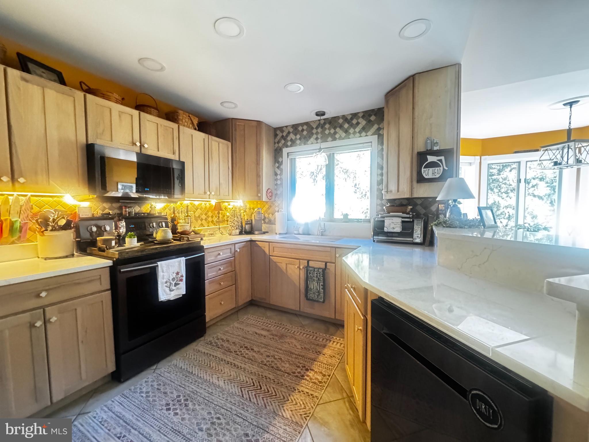 11028 RAMBLEWOOD DRIVE NW